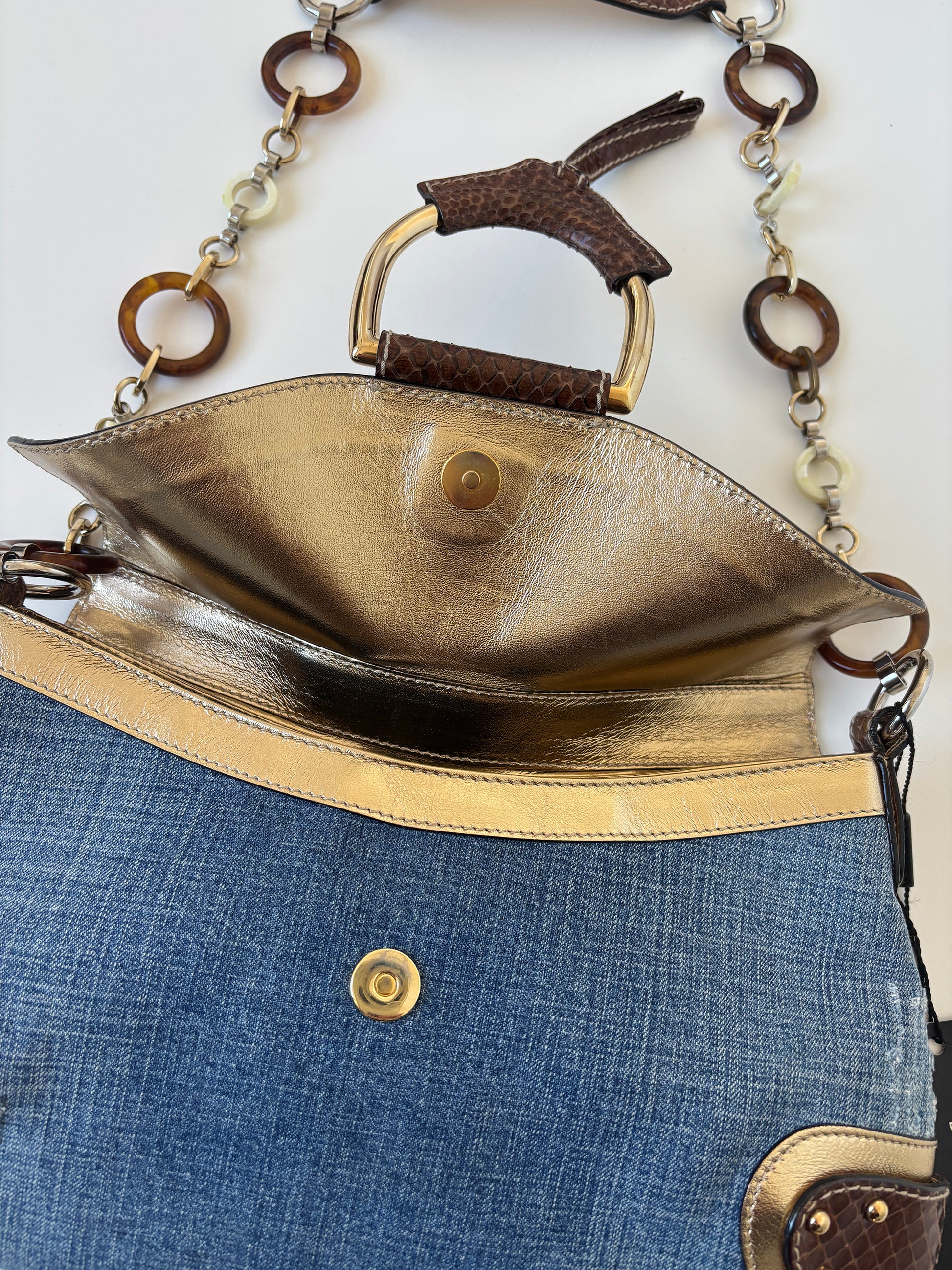 Vintage Dolce &amp; Gabbana O-Ring SS 2005 XL baguette bag python leather and denim with chunky ring details. Iconic cheetah print lining.