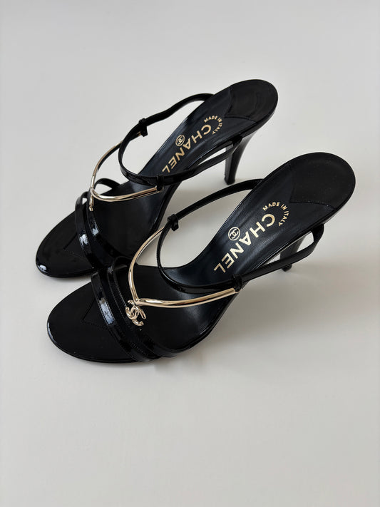 Vintage Chanel by Karl Lagerfeld 2000s black mules with golden CC logo tiara details. Very rare find.