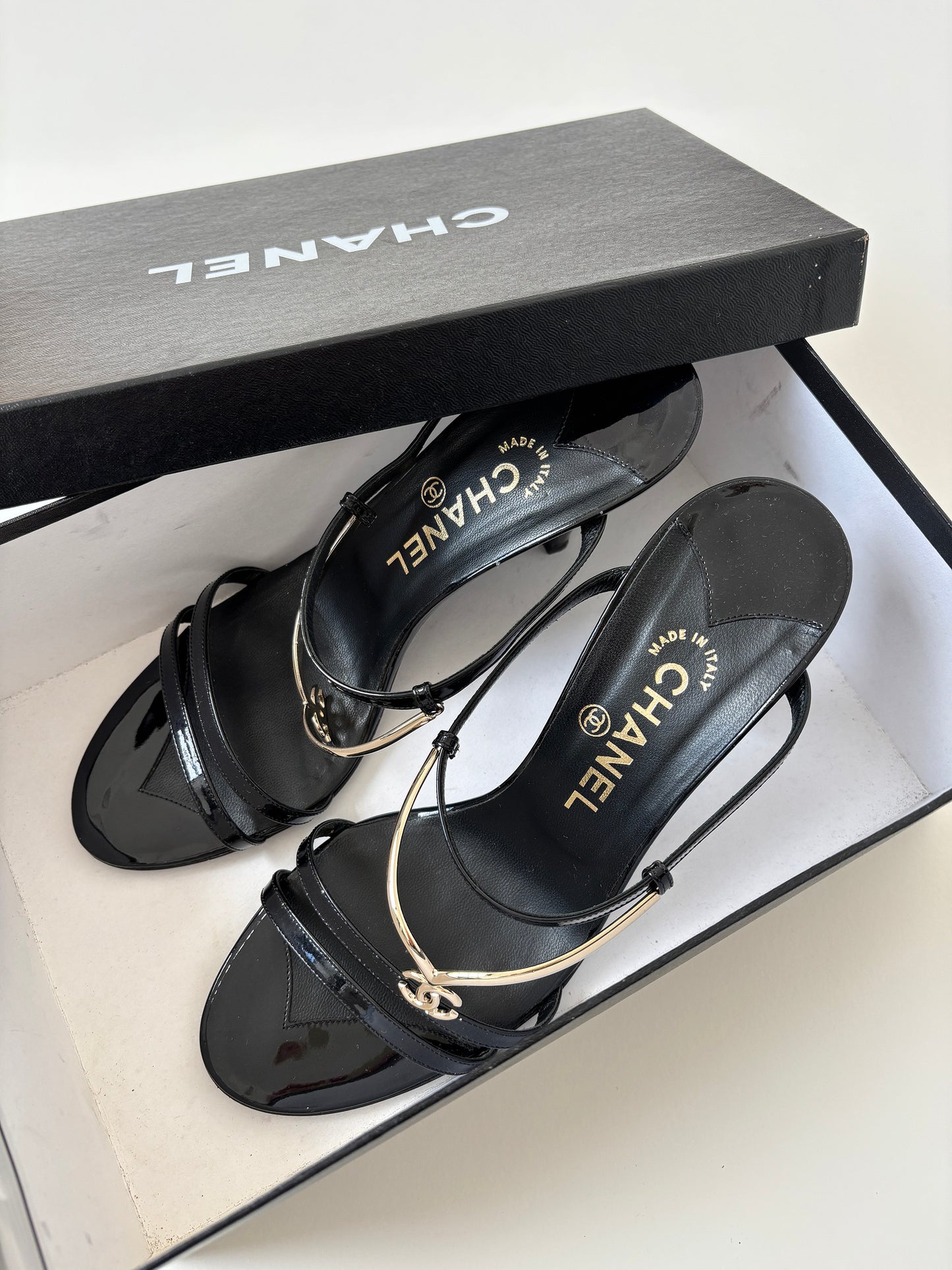 Vintage Chanel by Karl Lagerfeld 2000s black mules with golden CC logo tiara details. Very rare find.