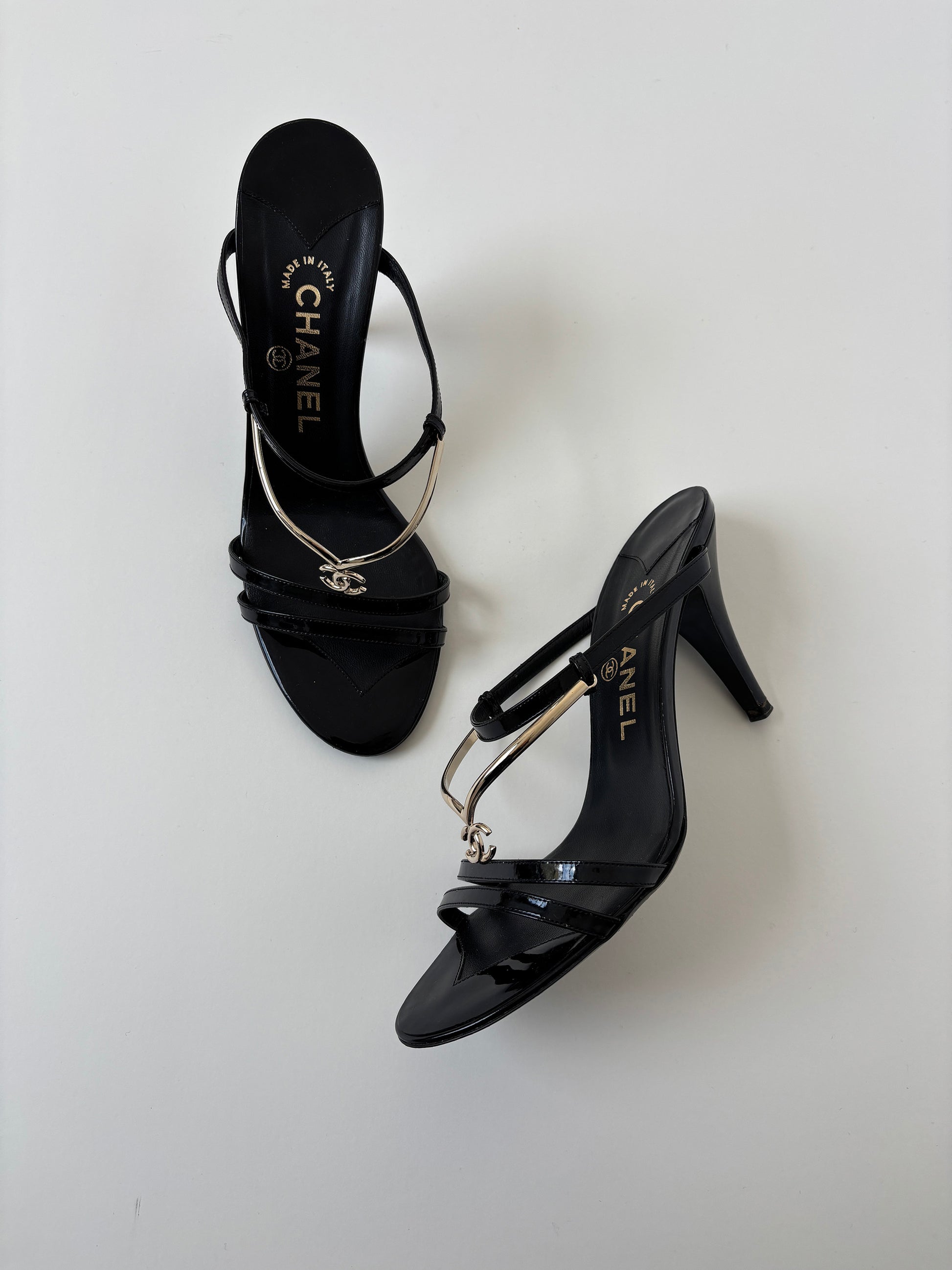 Vintage Chanel by Karl Lagerfeld 2000s black mules with golden CC logo tiara details. Very rare find.