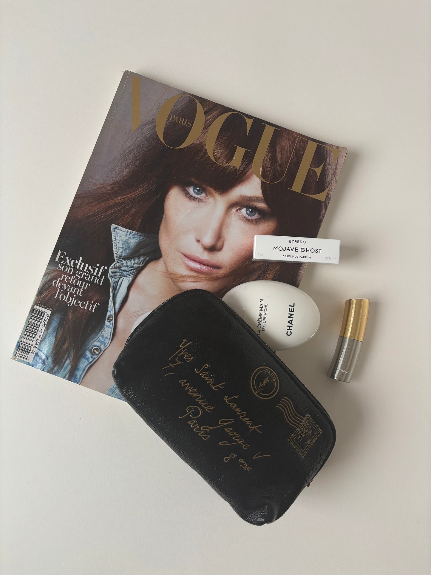 Vintage YSL by Tom Ford 2000s mini pochette with golden postcard print.