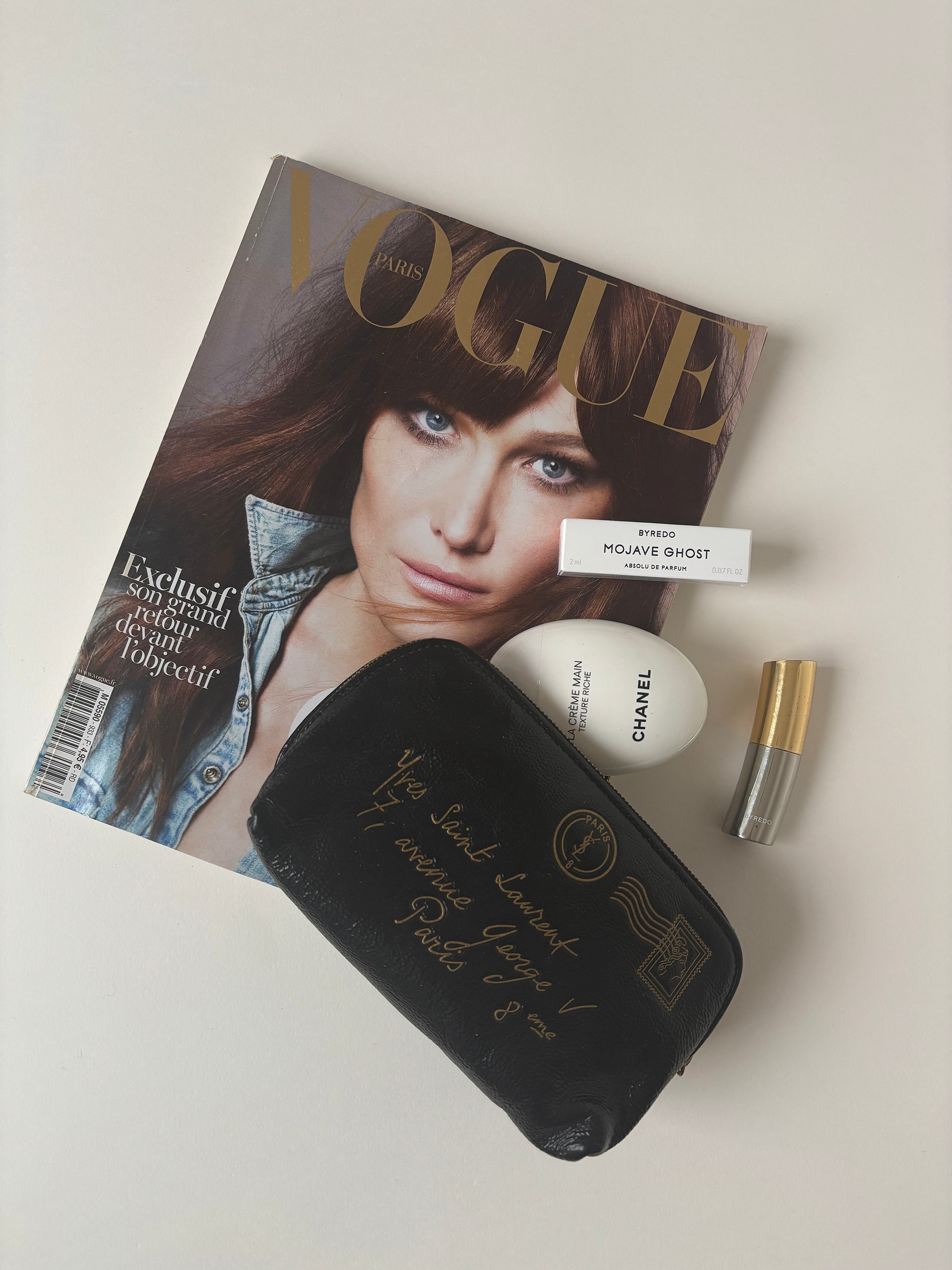 Vintage YSL by Tom Ford 2000s mini pochette with golden postcard print.