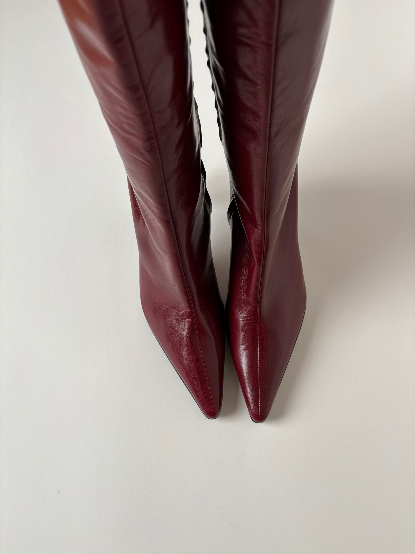 Vintage Sergio Rossi 2000s italian luxuryred boots with midi heel.