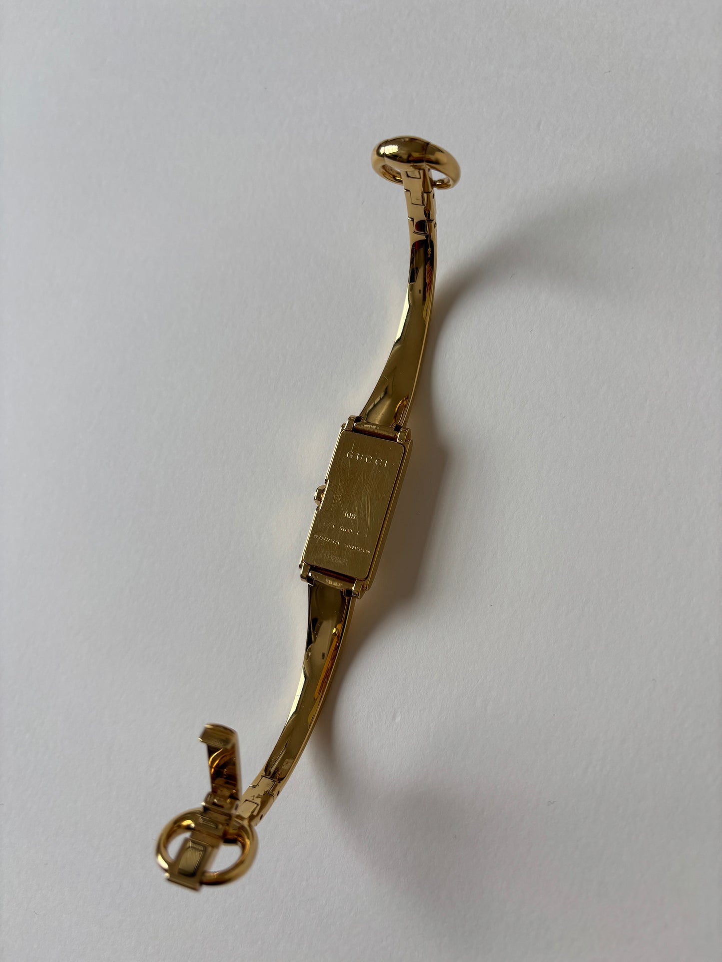 Gucci by Tom Ford 2000s 1500L 18K gold plated bangle watch