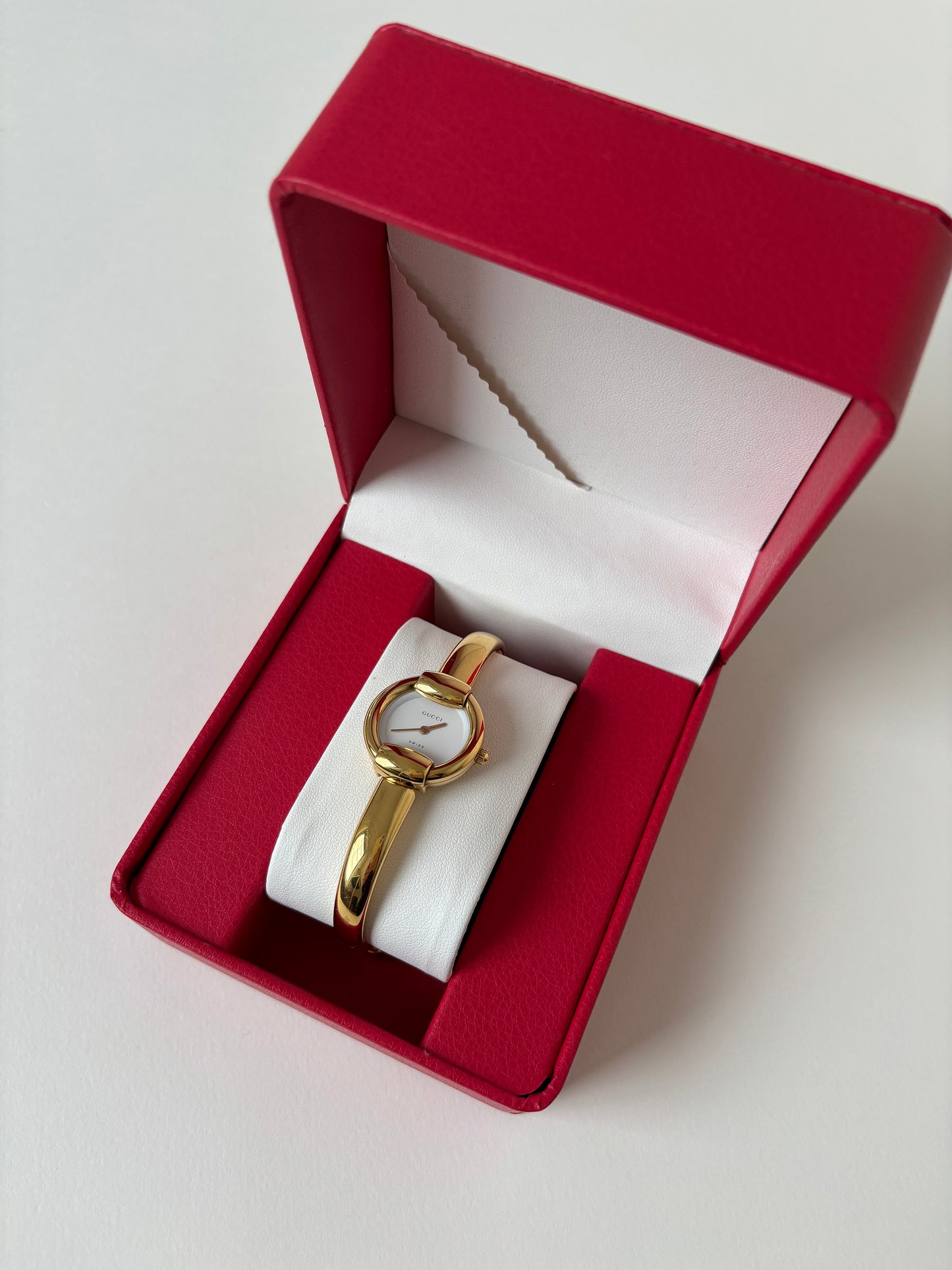 Gucci by Tom Ford 1990s 1400L 18K gold plated bangle watch