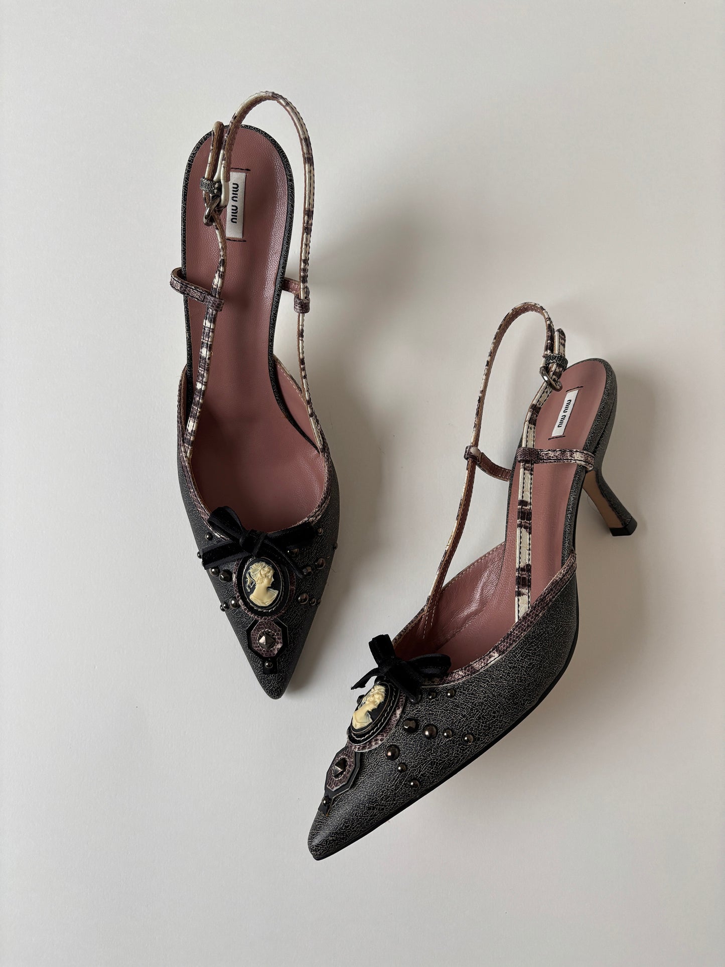 Vintage Miu Miu 2000s sling back kitten heels with shell gem and studs details. Very rare model.