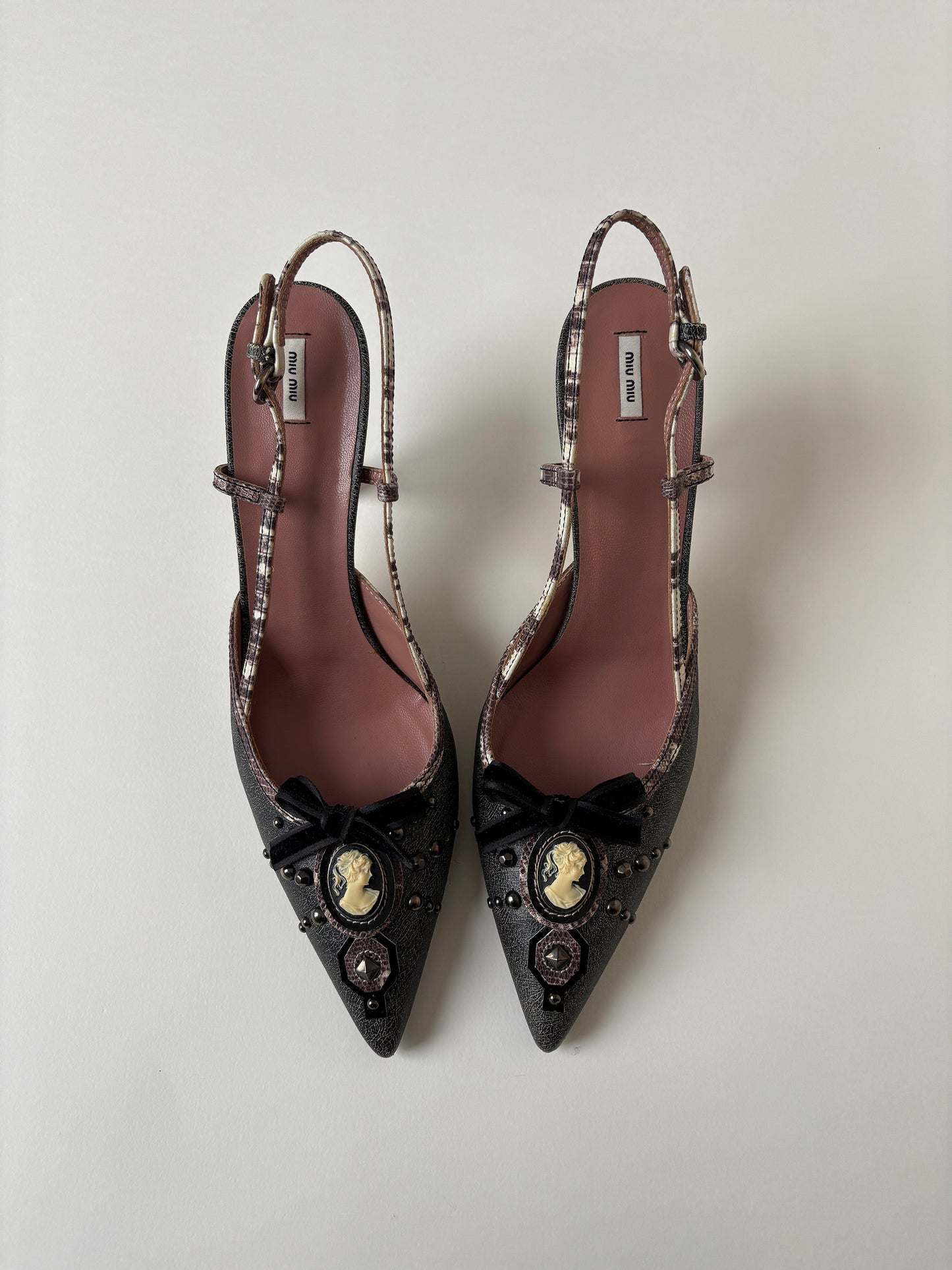 Vintage Miu Miu 2000s sling back kitten heels with shell gem and studs details. Very rare model.