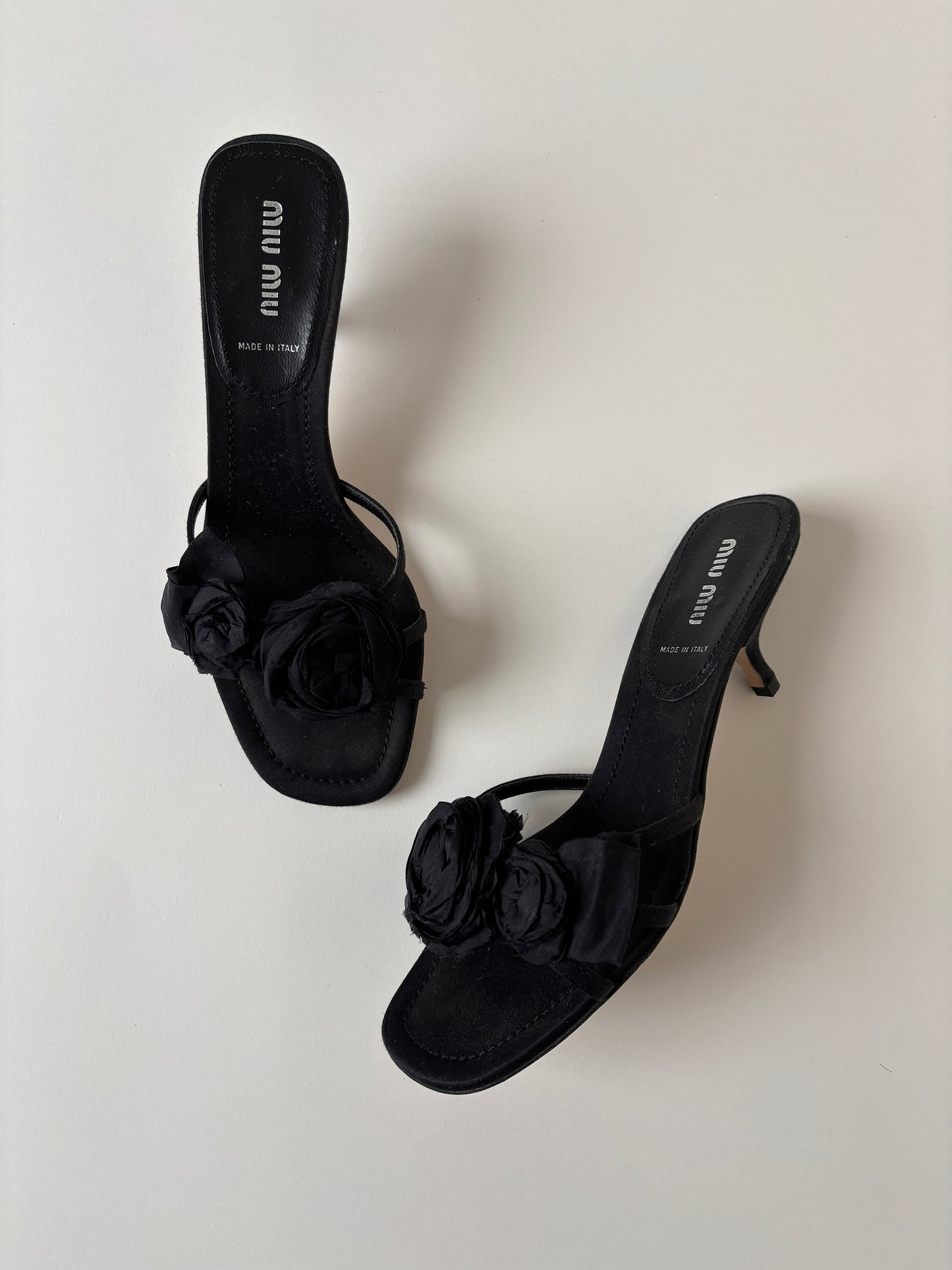 Vintage Miu Miu black floral kitten heels with cute silk roses details.