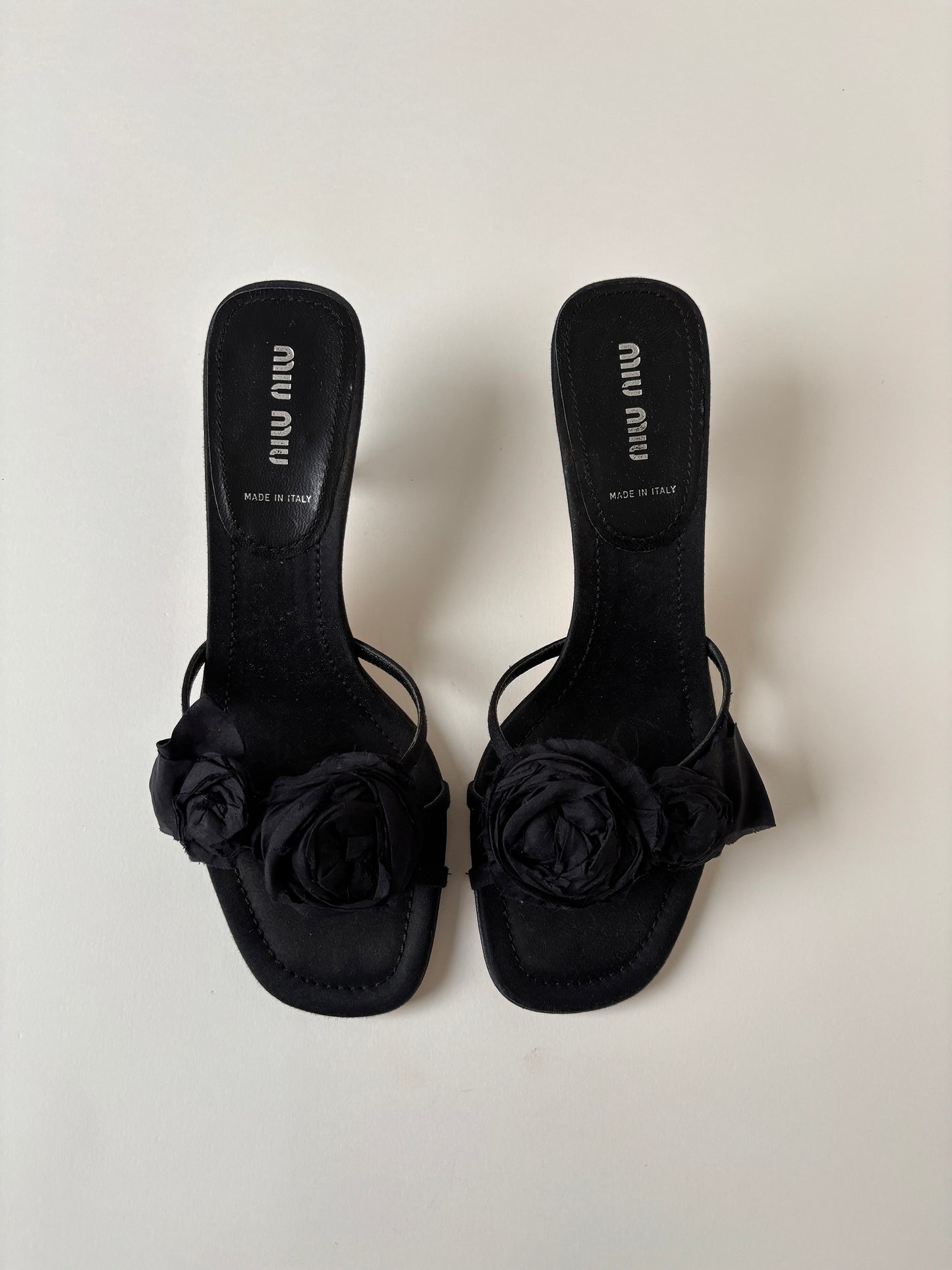 Vintage Miu Miu black floral kitten heels with cute silk roses details.