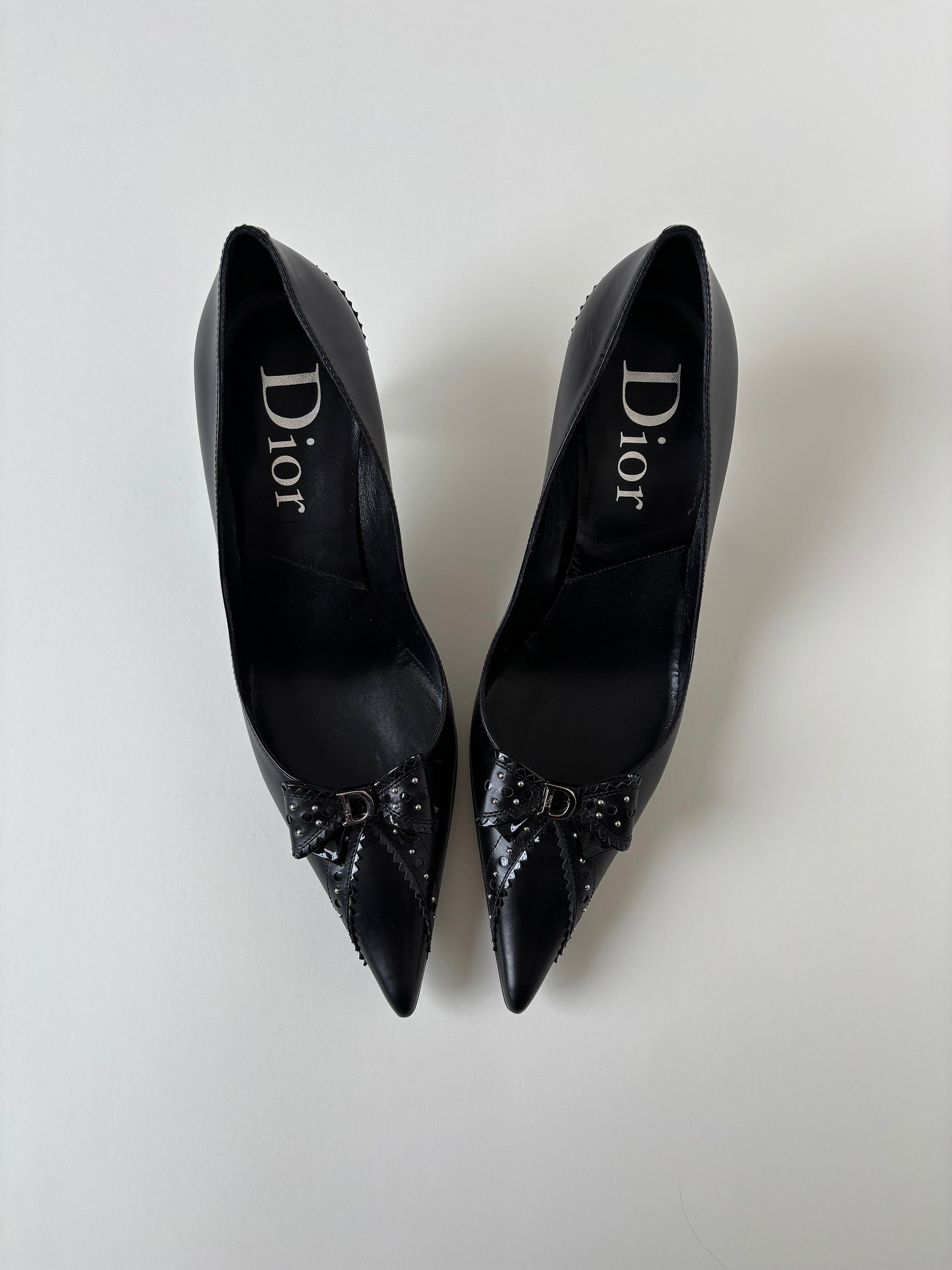 Vintage Christian Dior by John Galliano 2000s black D Trick bow kitten heels with cute mini logo and dainty eyelets.