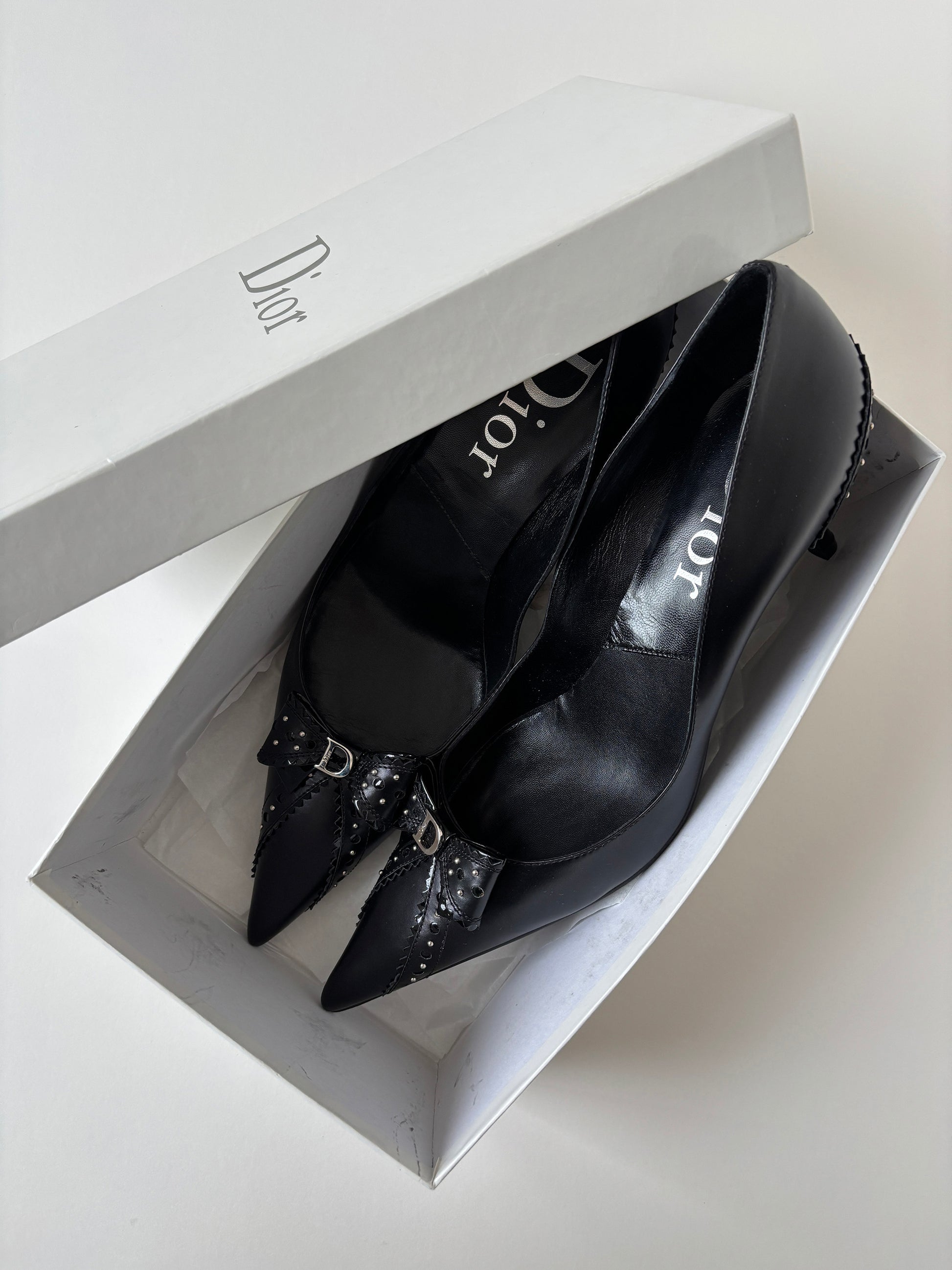 Vintage Christian Dior by John Galliano 2000s black D Trick bow kitten heels with cute mini logo and dainty eyelets.