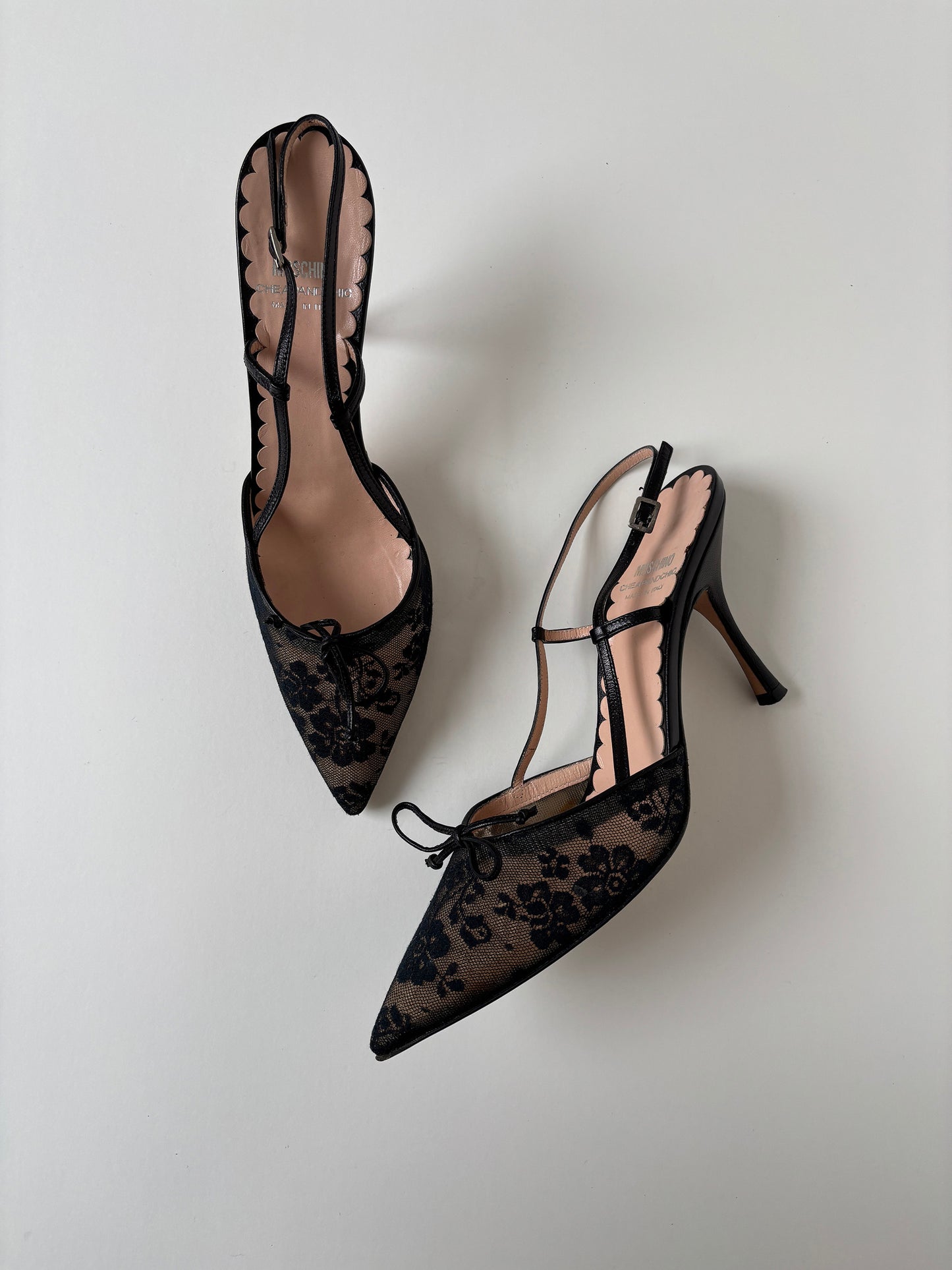 Vintage Moschino 2000s black sling back heels with black lace details and cute bow.

