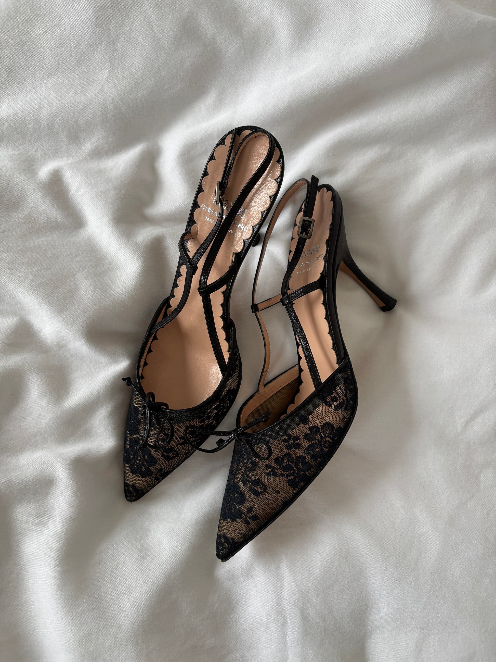 Vintage Moschino 2000s black sling back heels with black lace details and cute bow.
