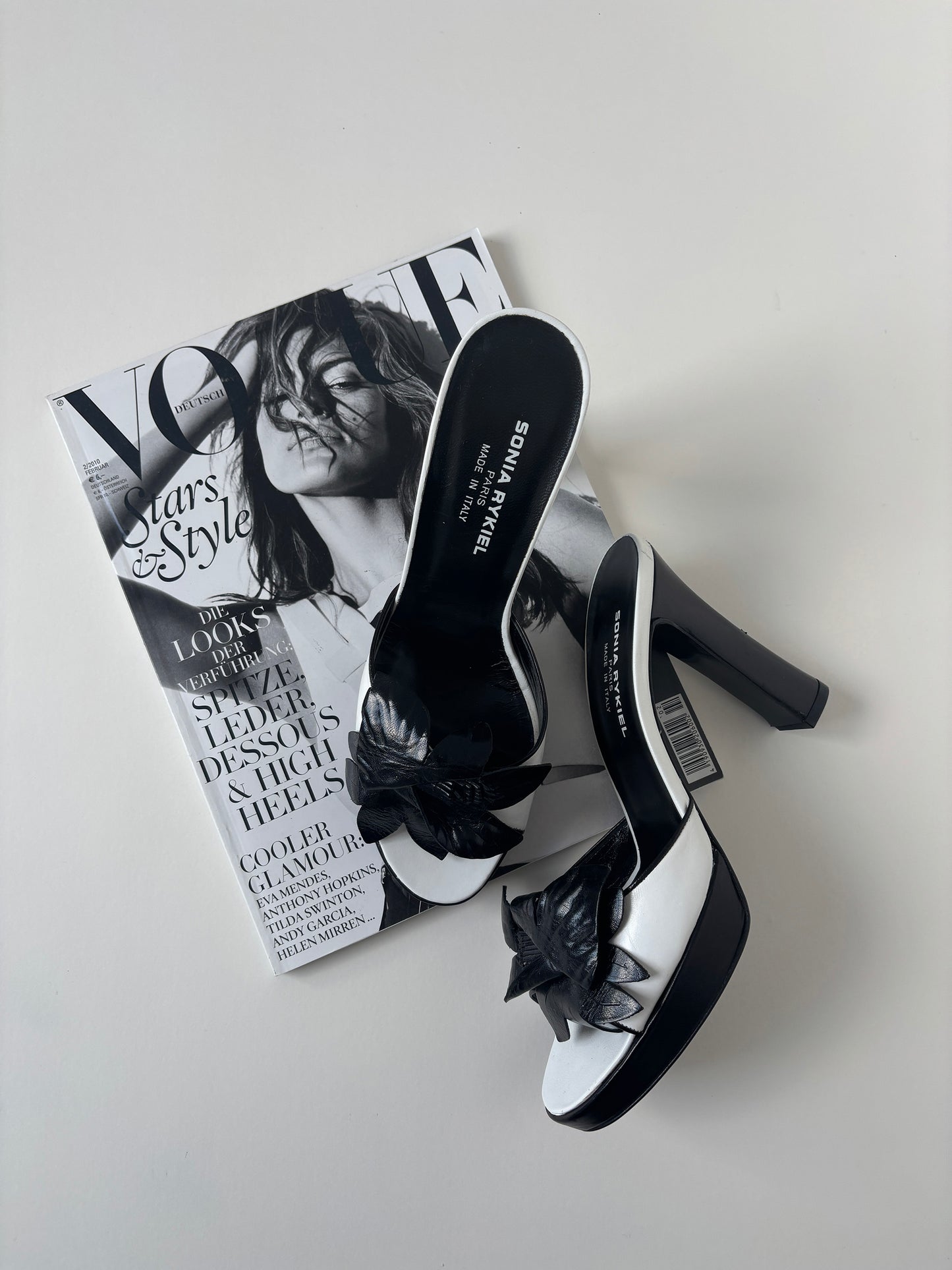 Vintage Sonia Rykiel 2000s black and white floral platform mules with chunky flower application.