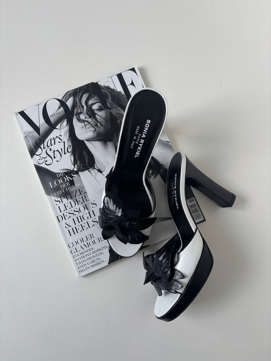 Vintage Sonia Rykiel 2000s black and white floral platform mules with chunky flower application.