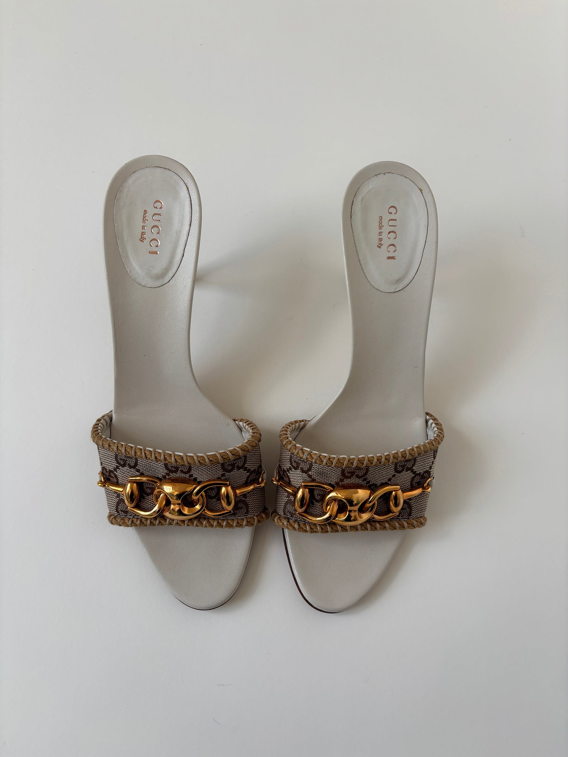Vintage 2000s Gucci by Tom Ford beige monogram sandals with golden chain details.