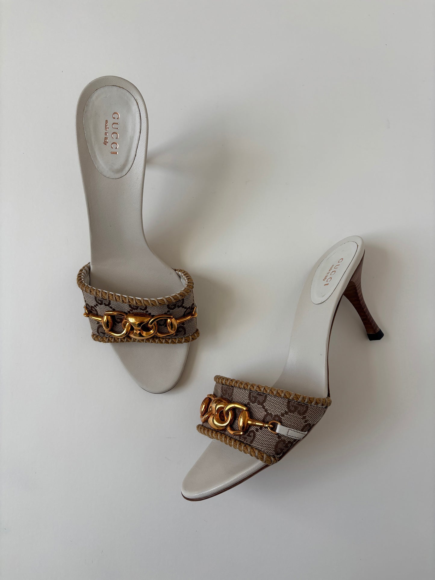 Vintage 2000s Gucci by Tom Ford beige monogram sandals with golden chain details.