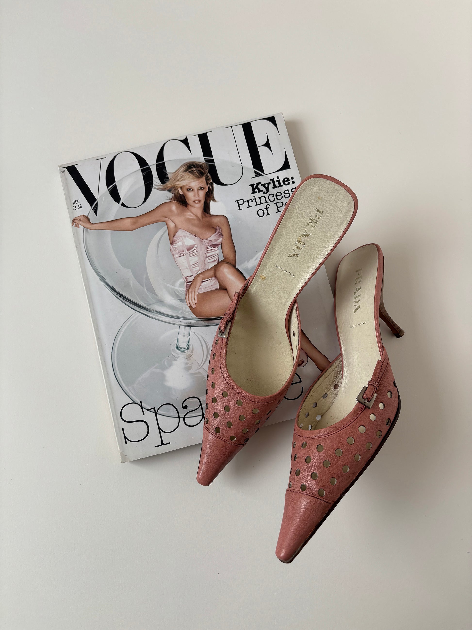 Vintage Prada 2000s pink eyelet mules with cute buckle details.