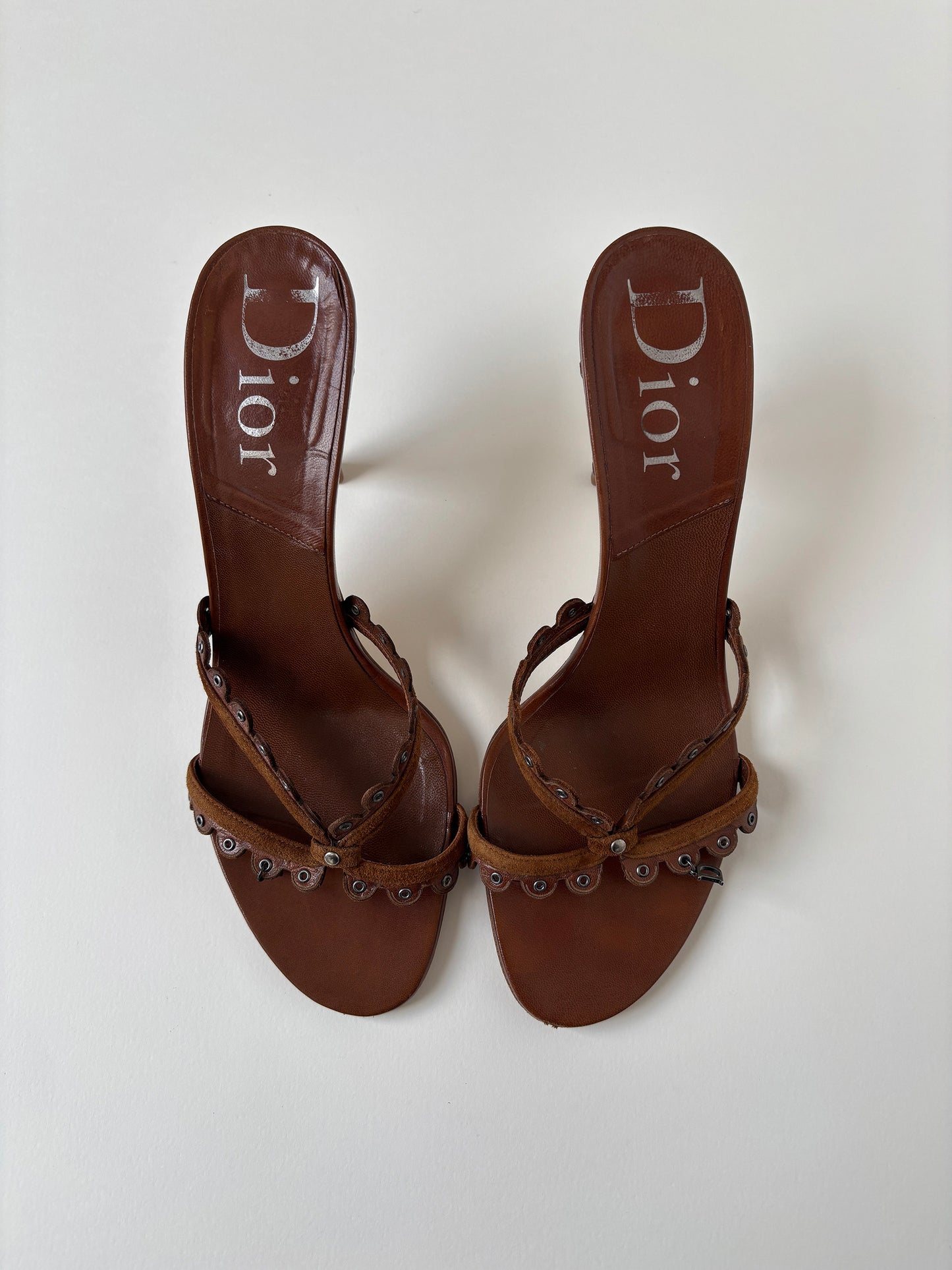 Vintage Christian Dior by John Galliano 2000s brown eyelet sandal heels with tiny metal logo detail.