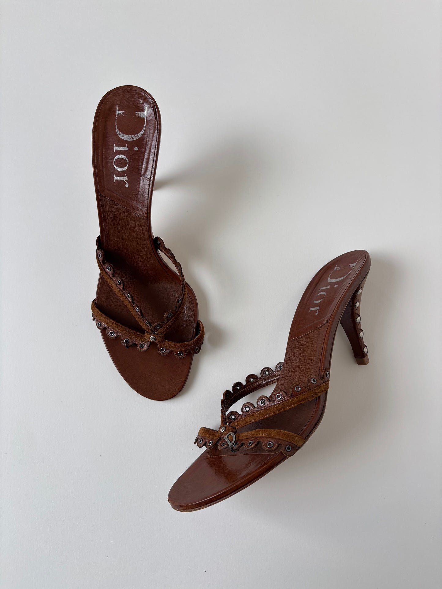 Vintage Christian Dior by John Galliano 2000s brown eyelet sandal heels with tiny metal logo detail.
