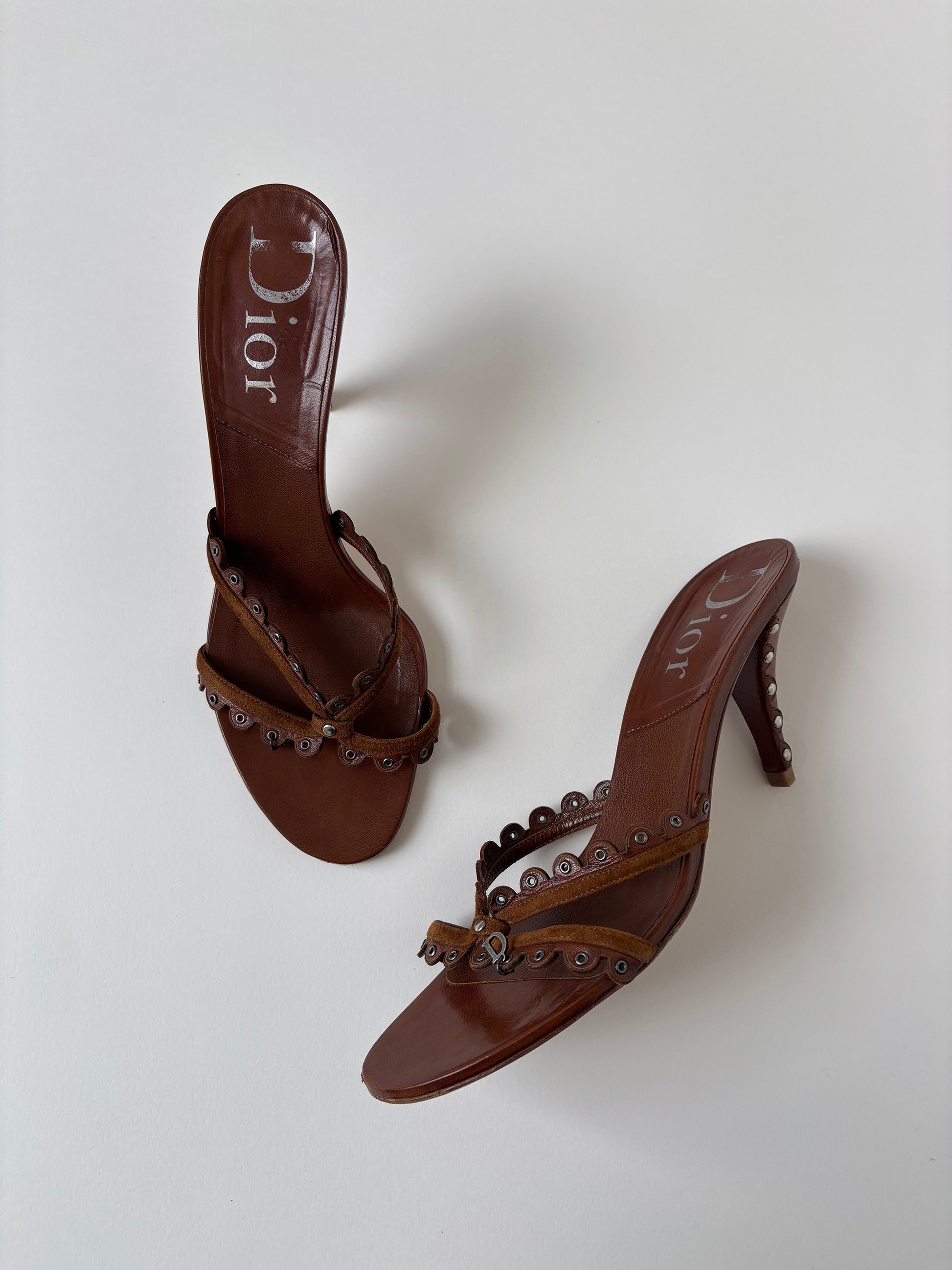 Vintage Christian Dior by John Galliano 2000s brown eyelet sandal heels with tiny metal logo detail.