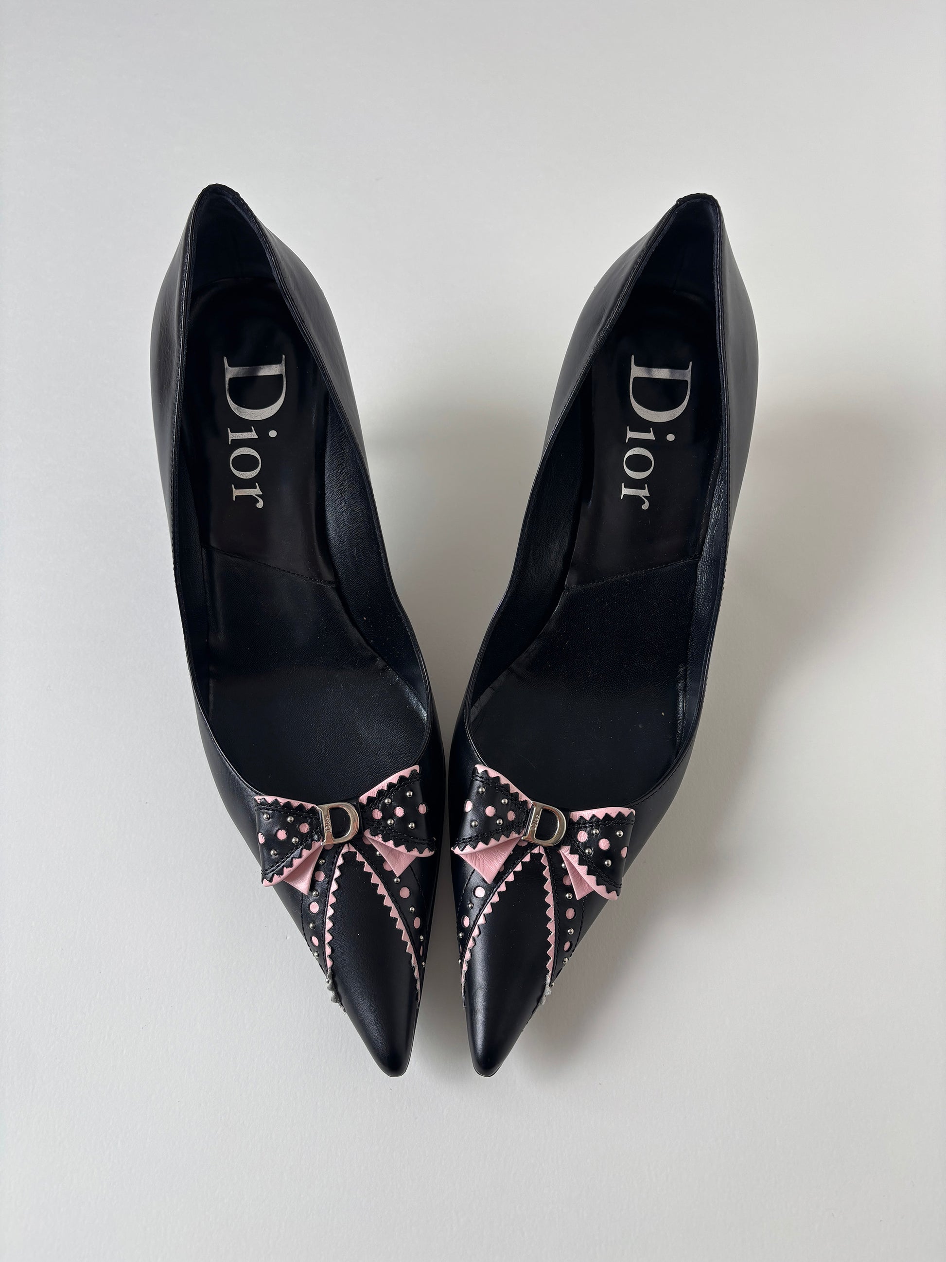 Vintage Christian Dior by John Galliano 2000s black pink D Trick bow kitten heels with cute mini logo and dainty eyelets.