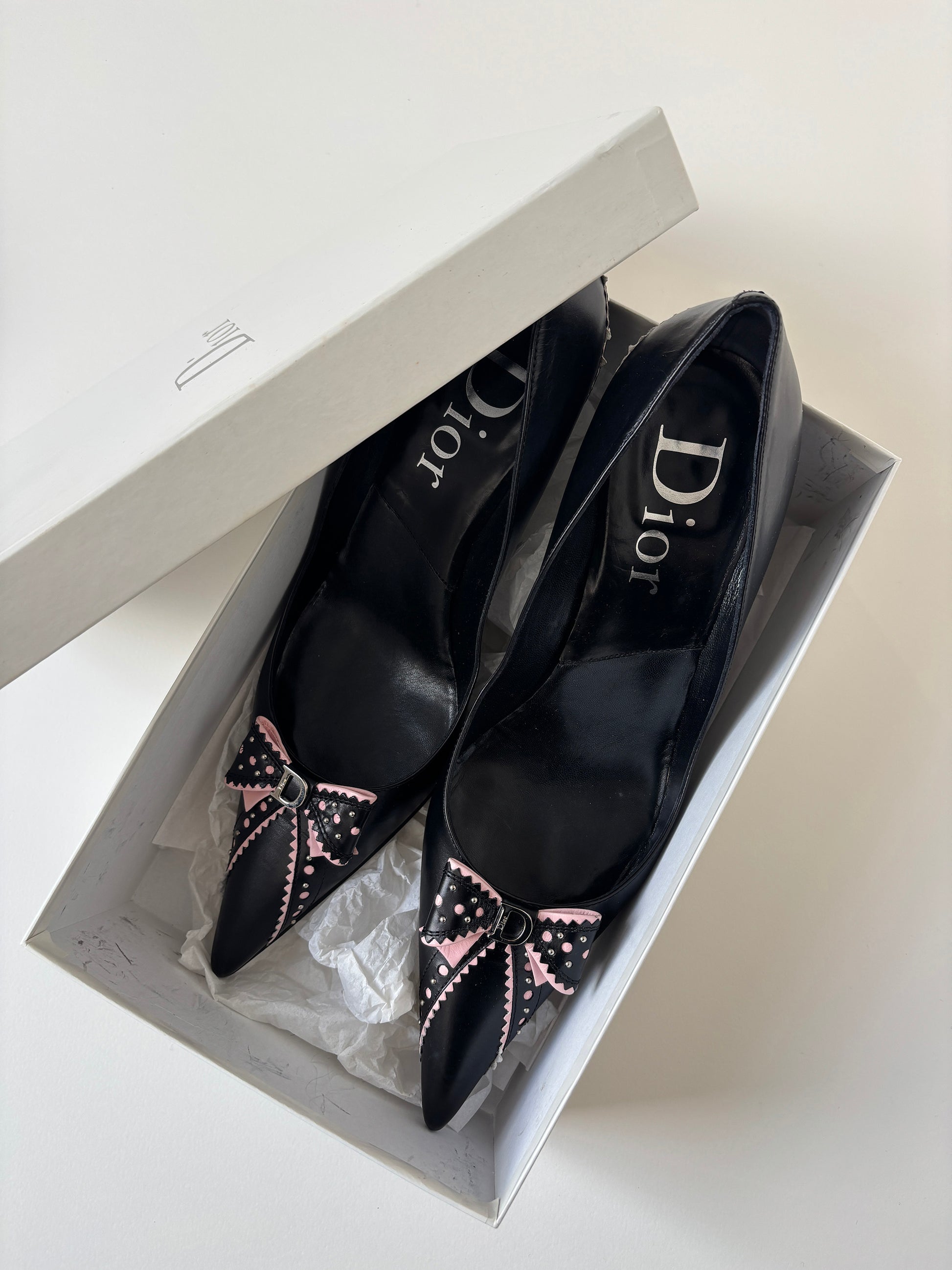 Vintage Christian Dior by John Galliano 2000s black pink D Trick bow kitten heels with cute mini logo and dainty eyelets.