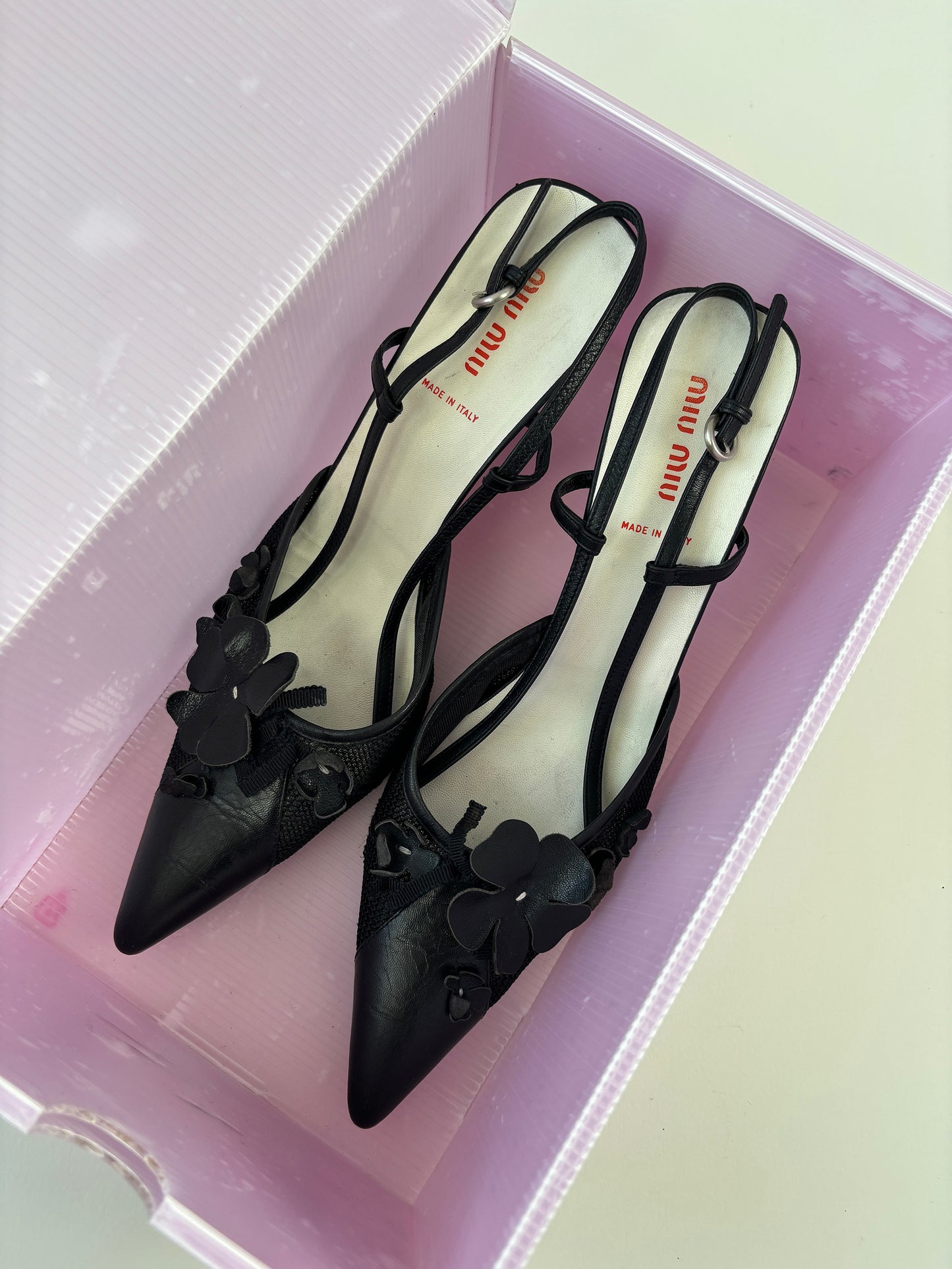 Vintage Miu Miu 2000s black floral mesh slingbacks with cute flower applications and mesh details.

