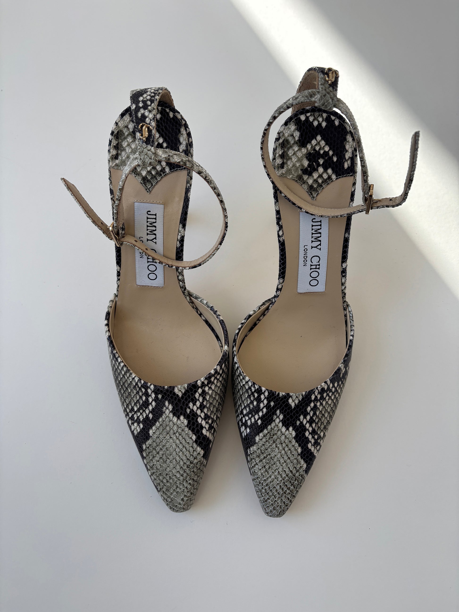 Vintage Jimmy Choo 2000s green snake heels with ankle straps.