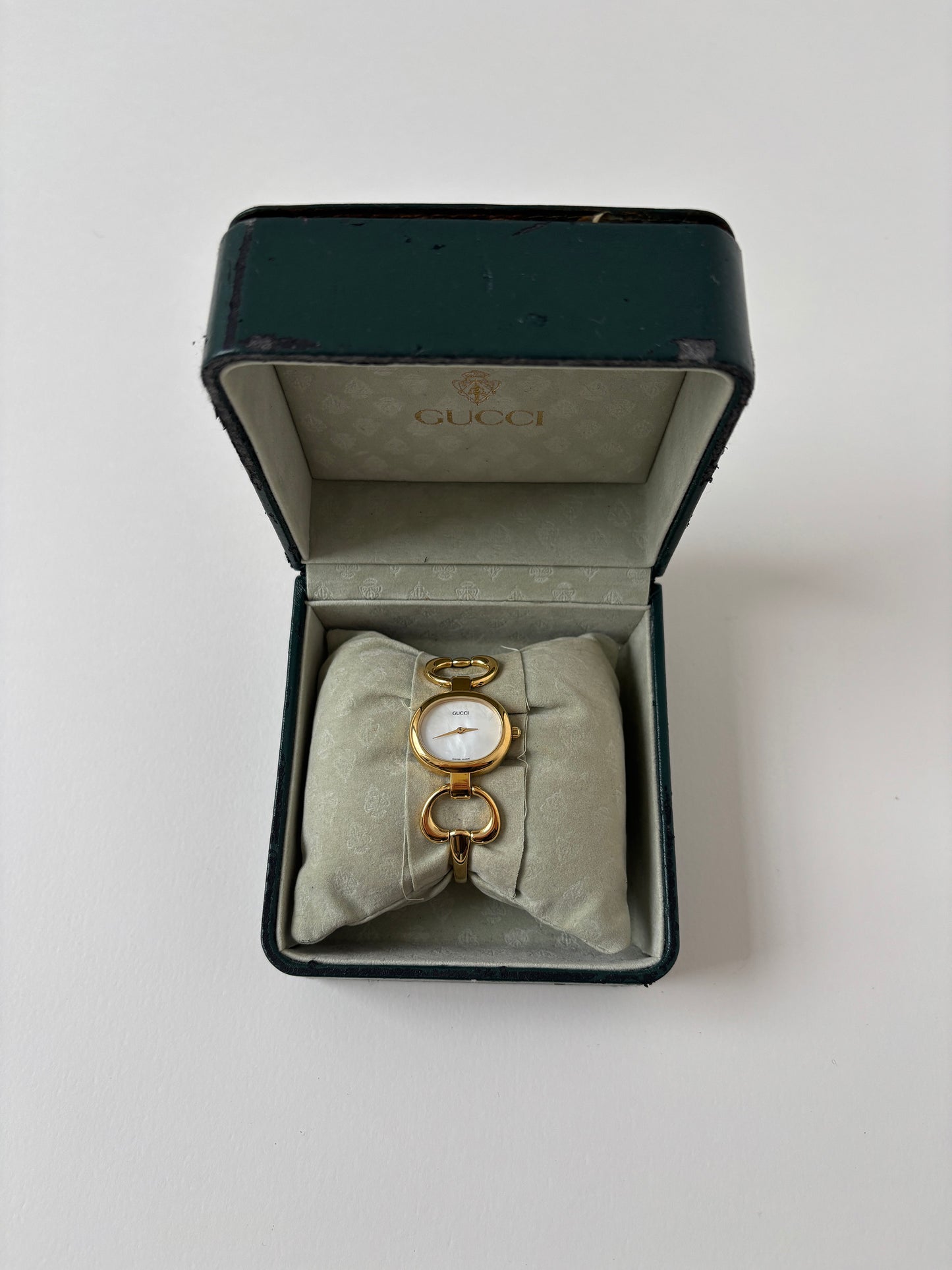 Gucci 1990s 18K gold plated mother of pearl bangle watch