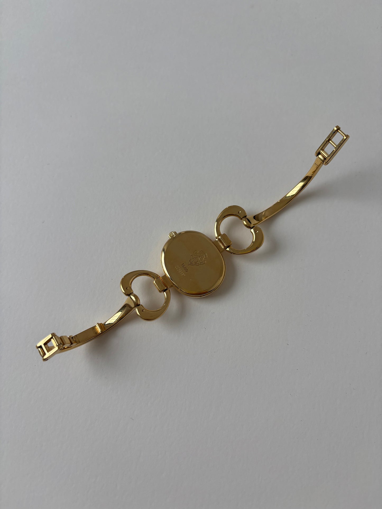 Gucci 1990s 18K gold plated mother of pearl bangle watch