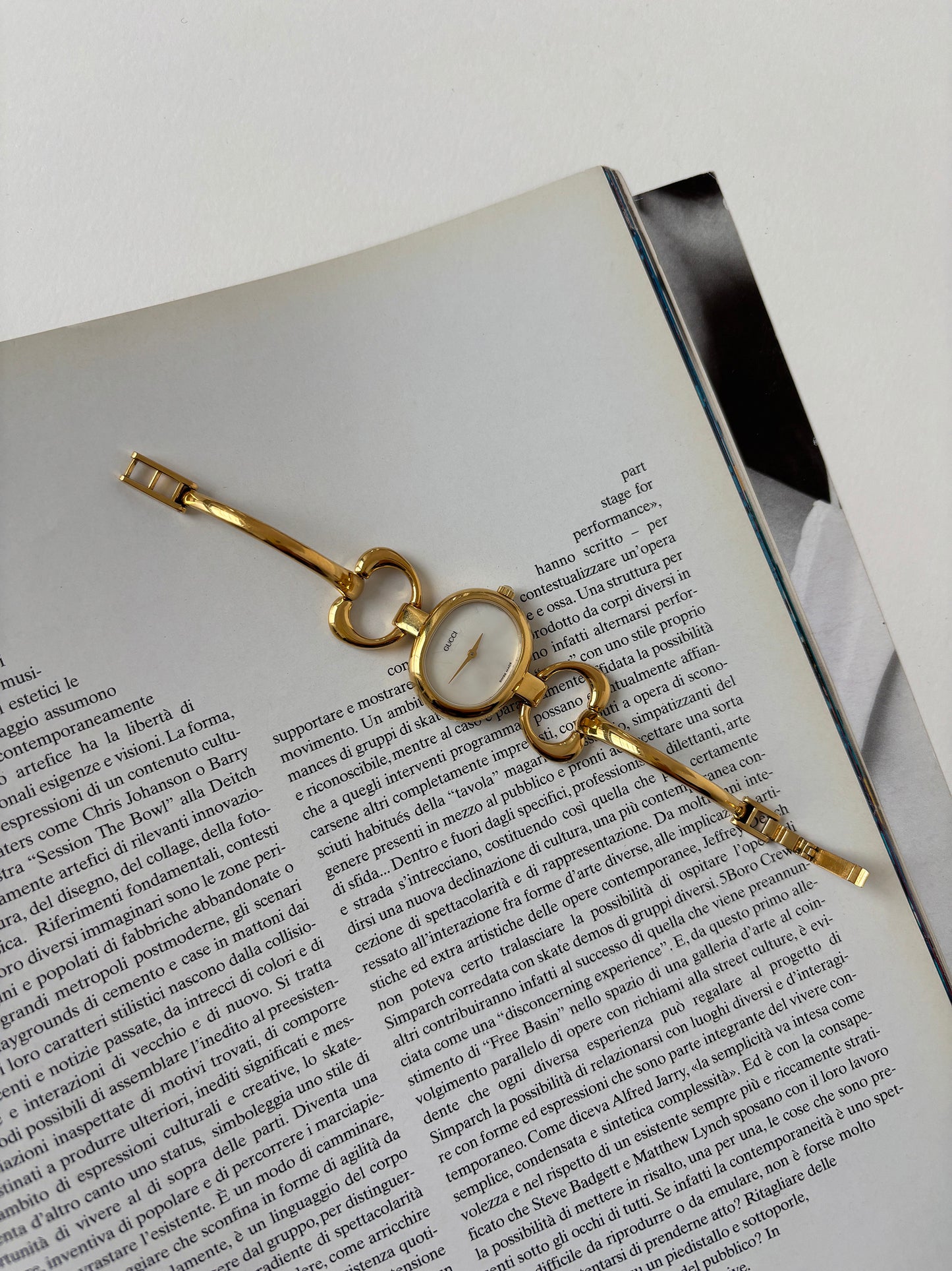 Gucci 1990s 18K gold plated mother of pearl bangle watch