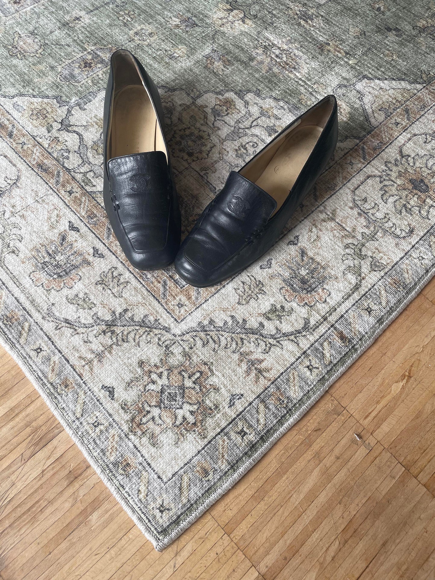 Vintage 90s Chanel CC black embroidered logo loafer.