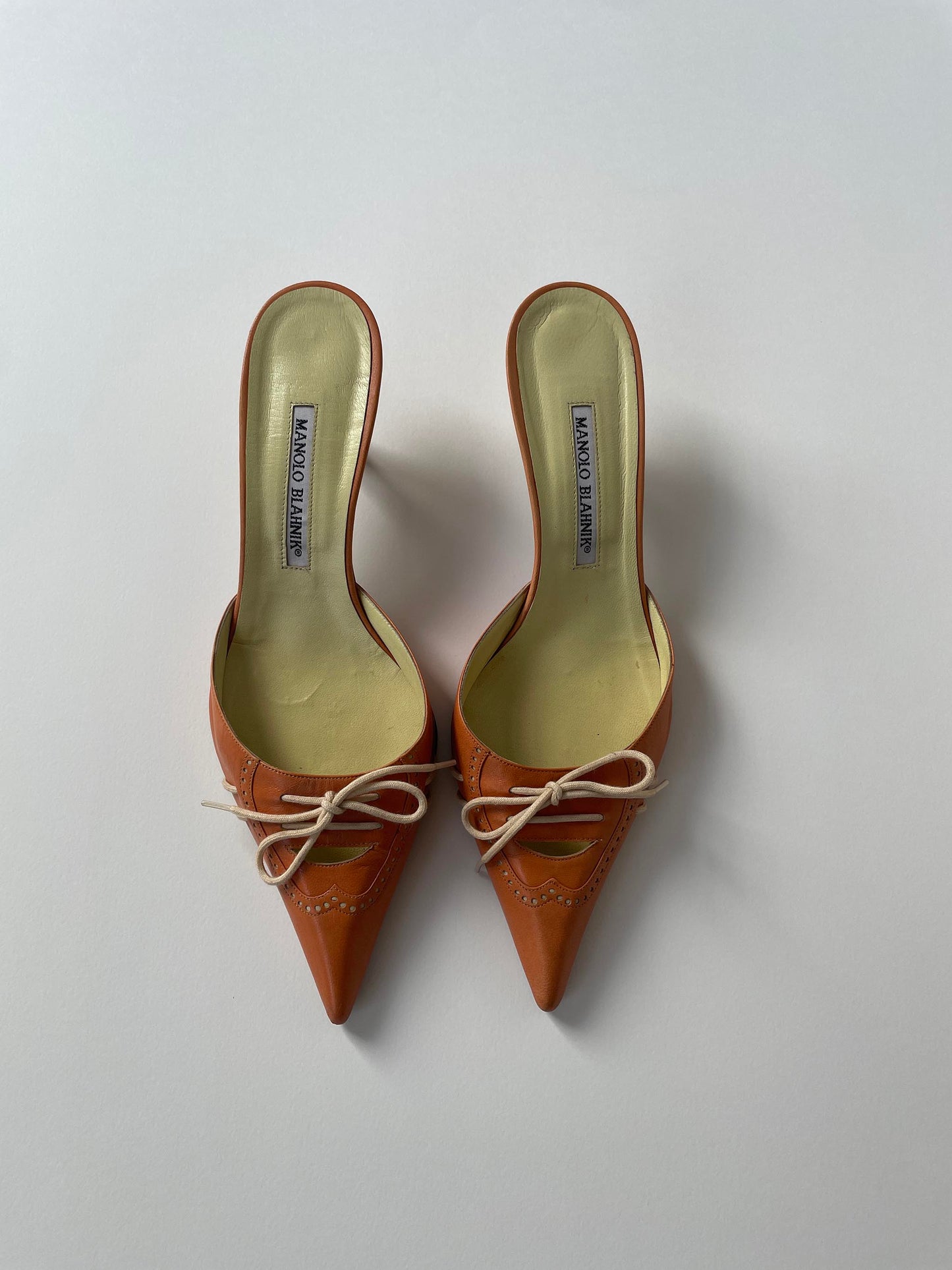 Vintage Manolo Blahnik lace kitten heel mules