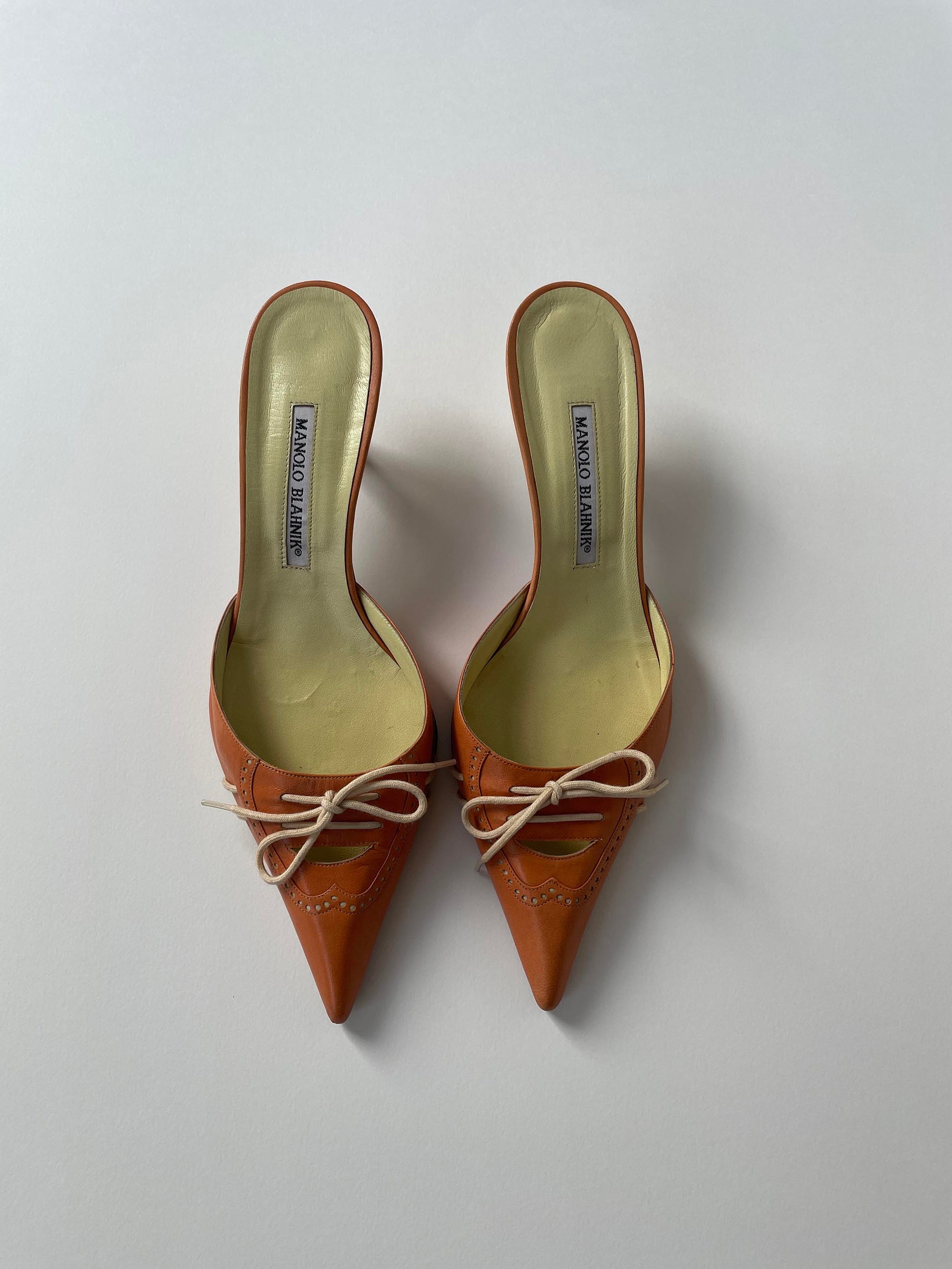 Vintage Manolo Blahnik lace kitten heel mules