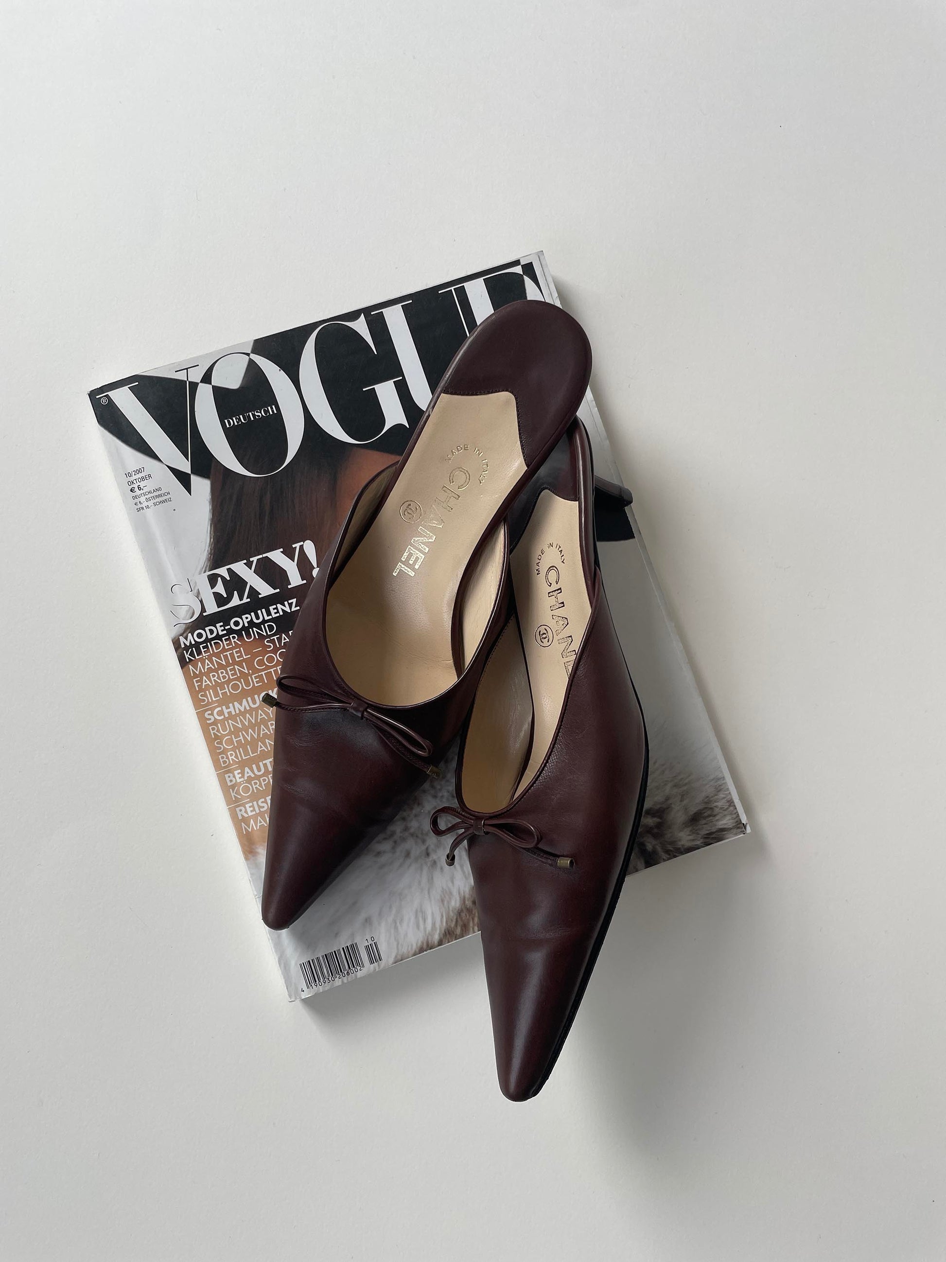 Vintage Chanel brown pointed kitten heel mules with tiny CC bow details