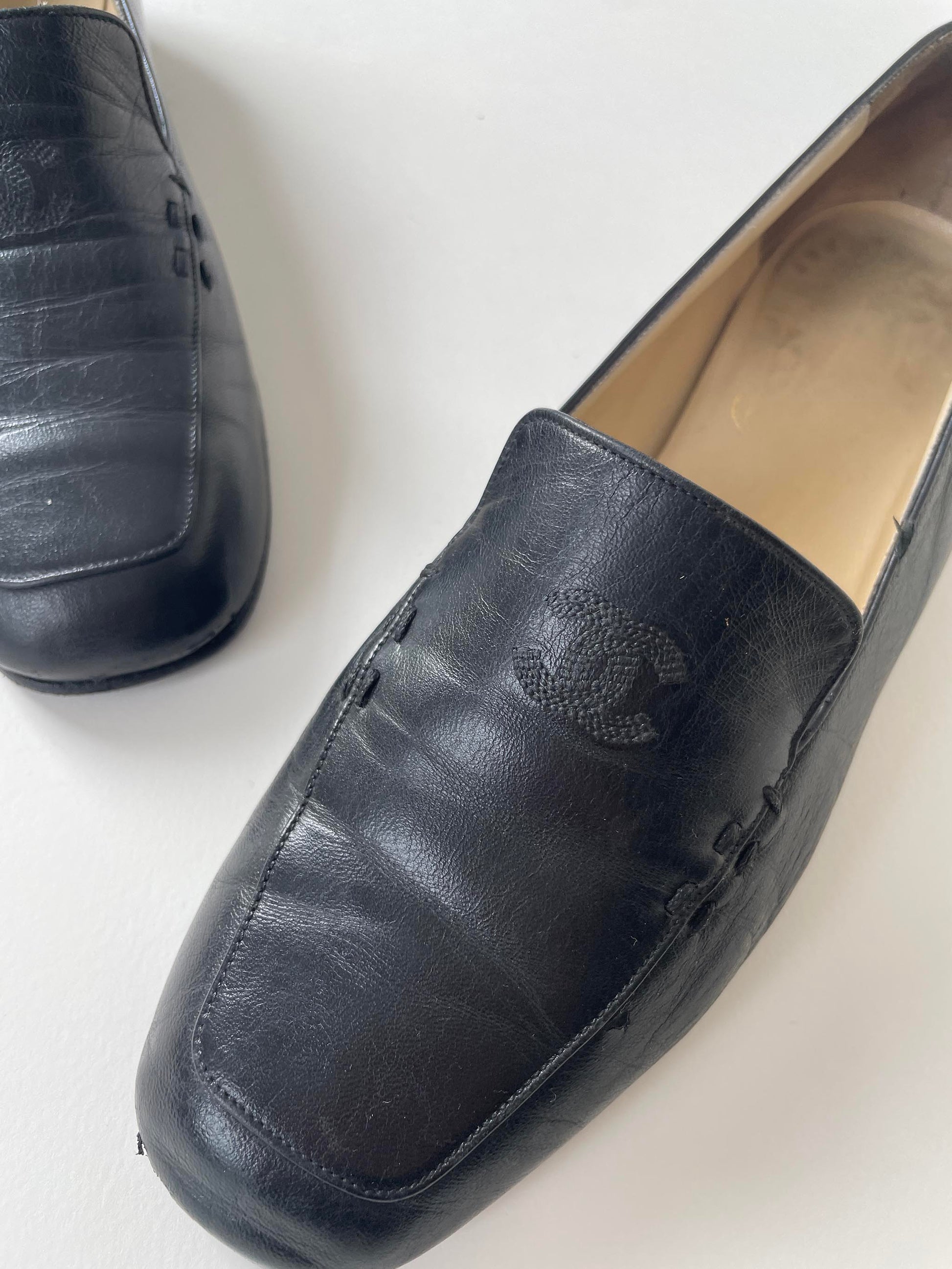 Vintage 90s Chanel CC black embroidered logo loafer.