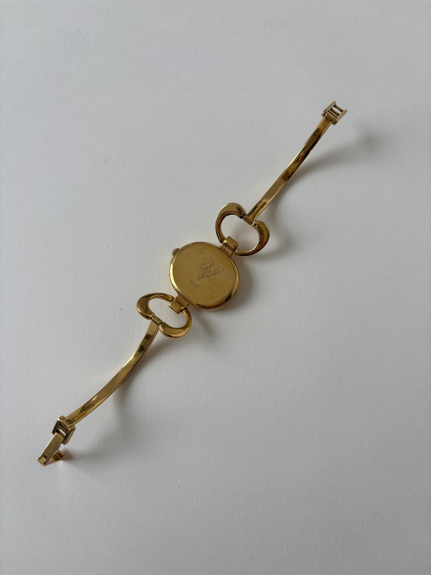 Gucci 1990s 18K gold plated mother of pearl bangle watch