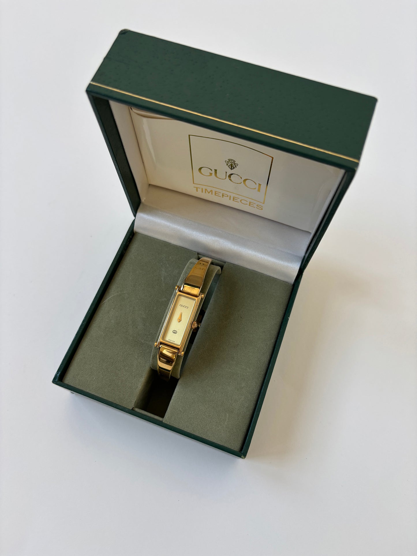 Gucci by Tom Ford 1990s 1500L 18K gold plated bangle watch
