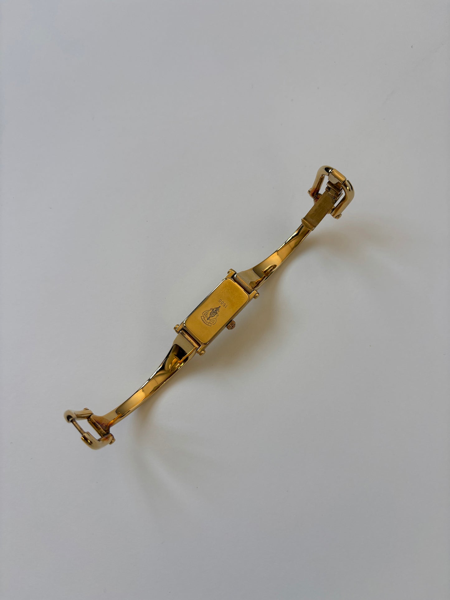 Gucci by Tom Ford 1990s 1500L 18K gold plated bangle watch