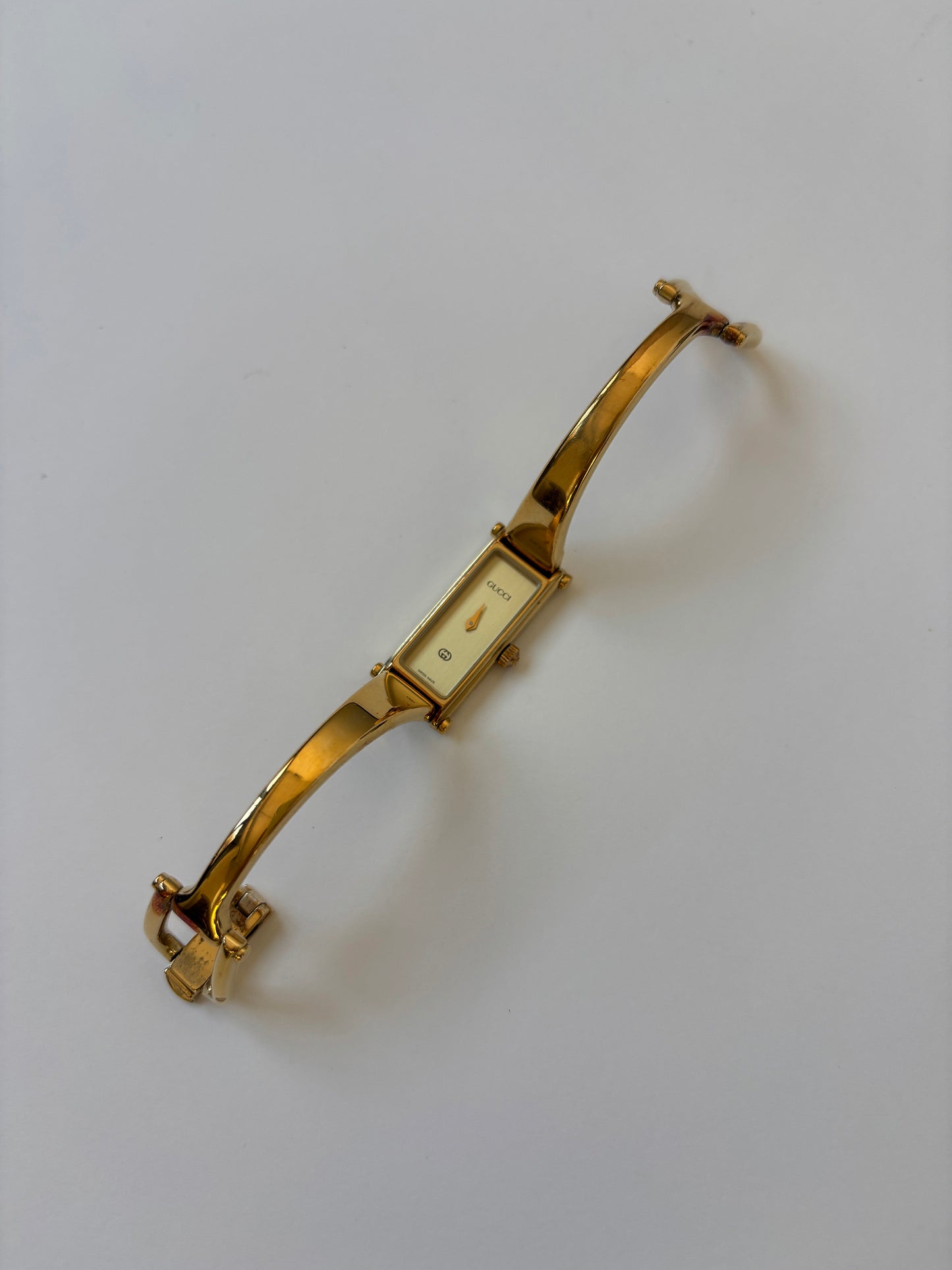 Gucci by Tom Ford 1990s 1500L 18K gold plated bangle watch