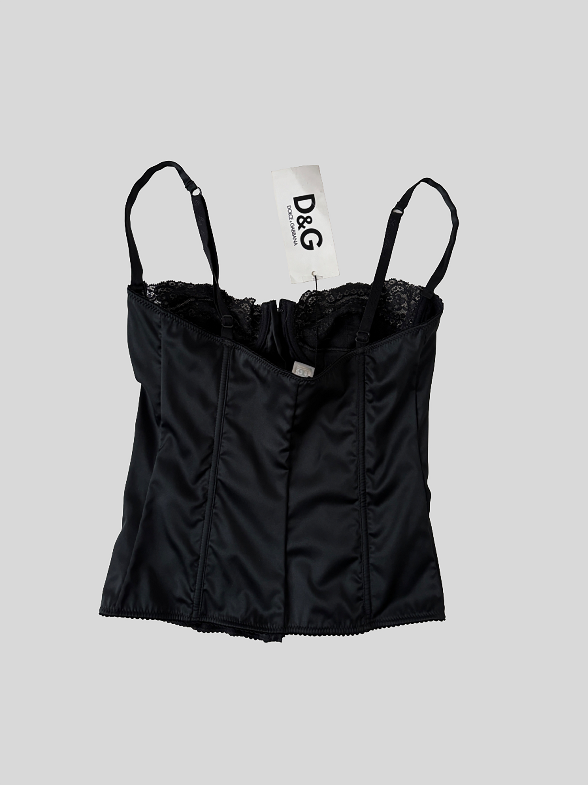 Vintage Dolce &amp; Gabbana 2000s black satin corset top with lace details.
