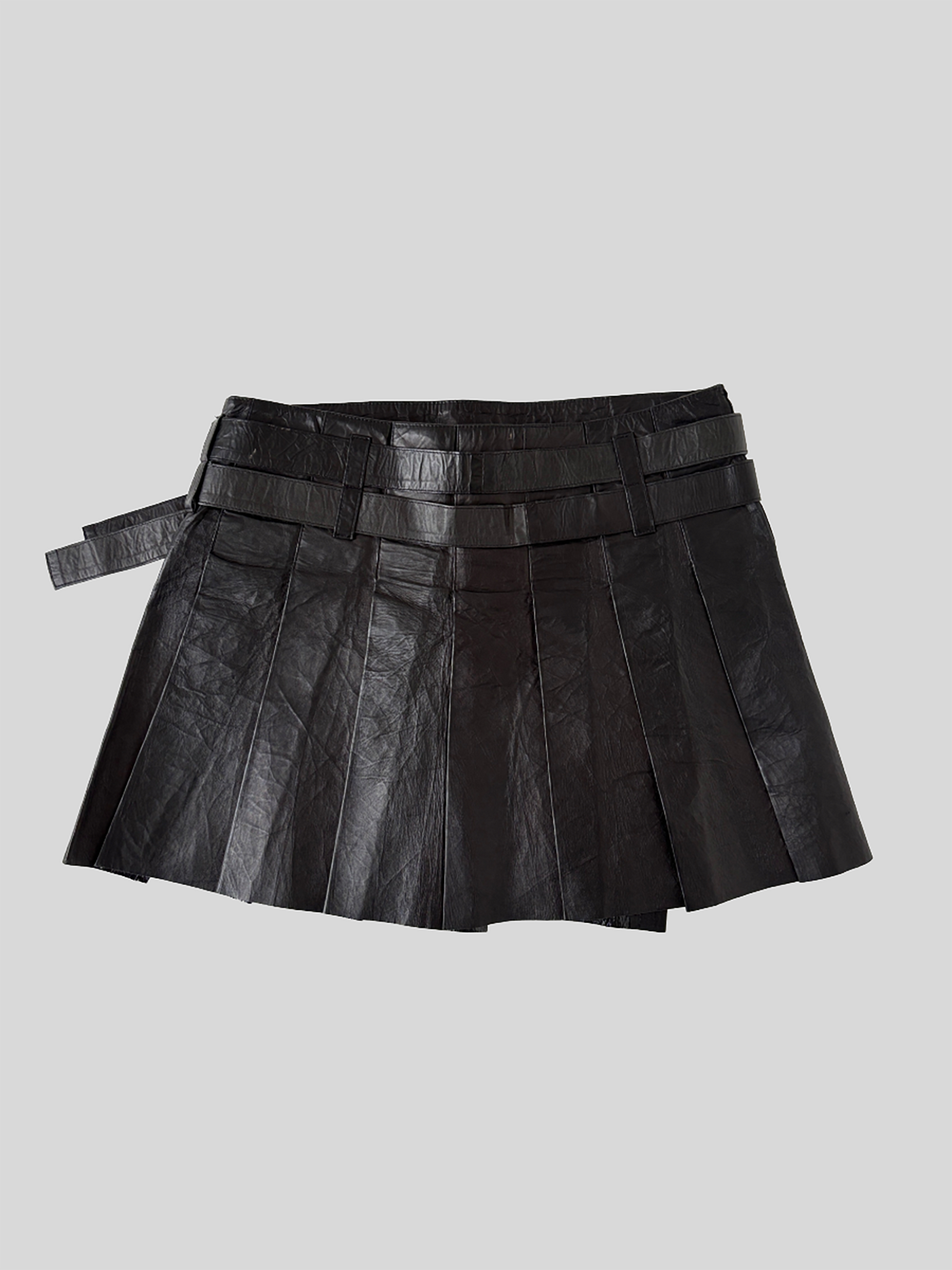 Vintage Burberry Brit crinkly leather mini skirt with adjustable leather straps.