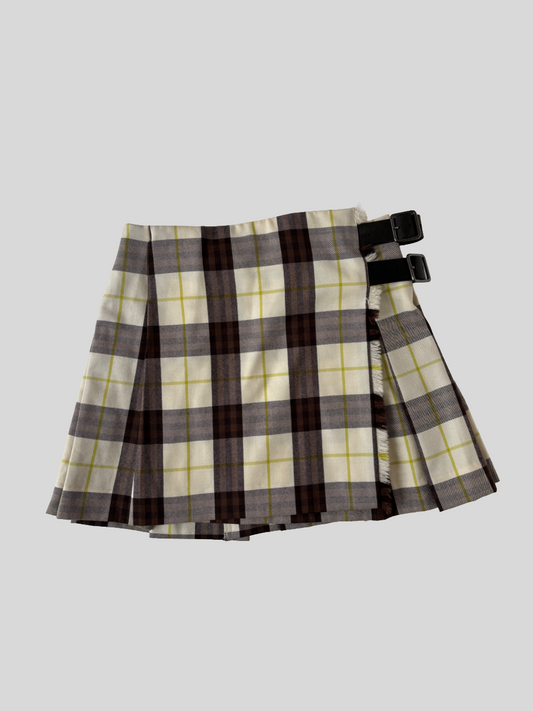 Vintage Burberry Brit iconic tartan wool mini skirt with iconic Kilt pattern and black adjustable leather straps.
