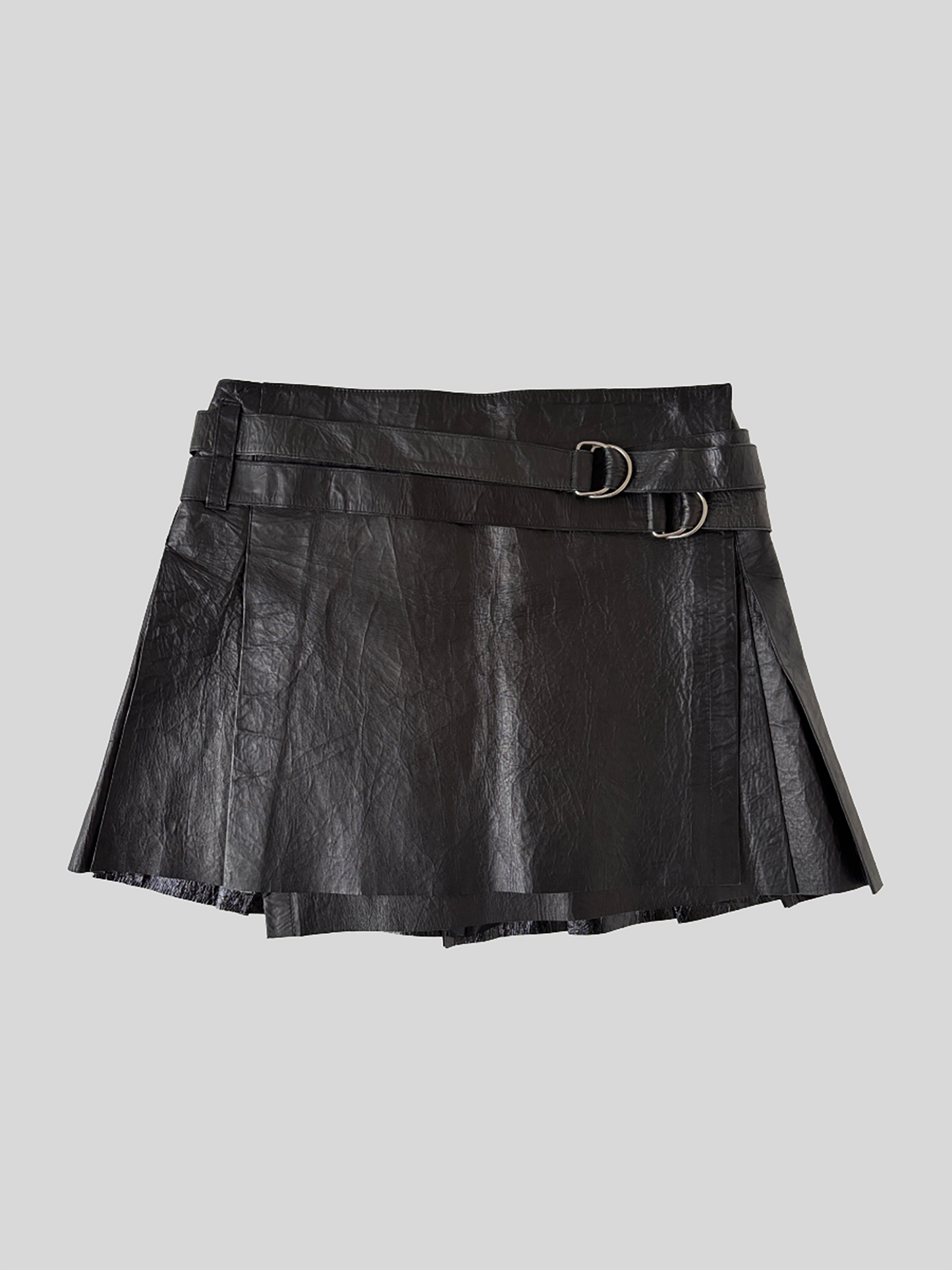 Vintage Burberry Brit crinkly leather mini skirt with adjustable leather straps.